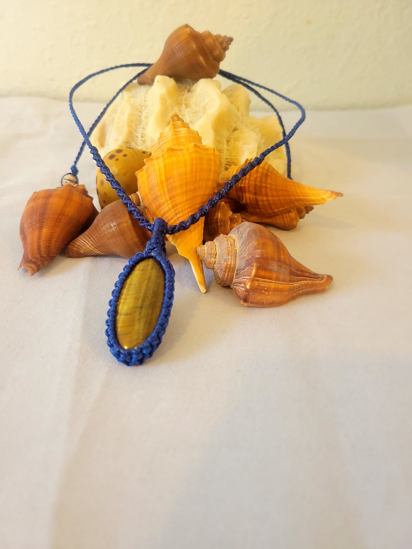 “Skyline Strength” – Elongated Oval Tiger Eye Pendant, Blue Cord, Minimalist Adjustable Necklace