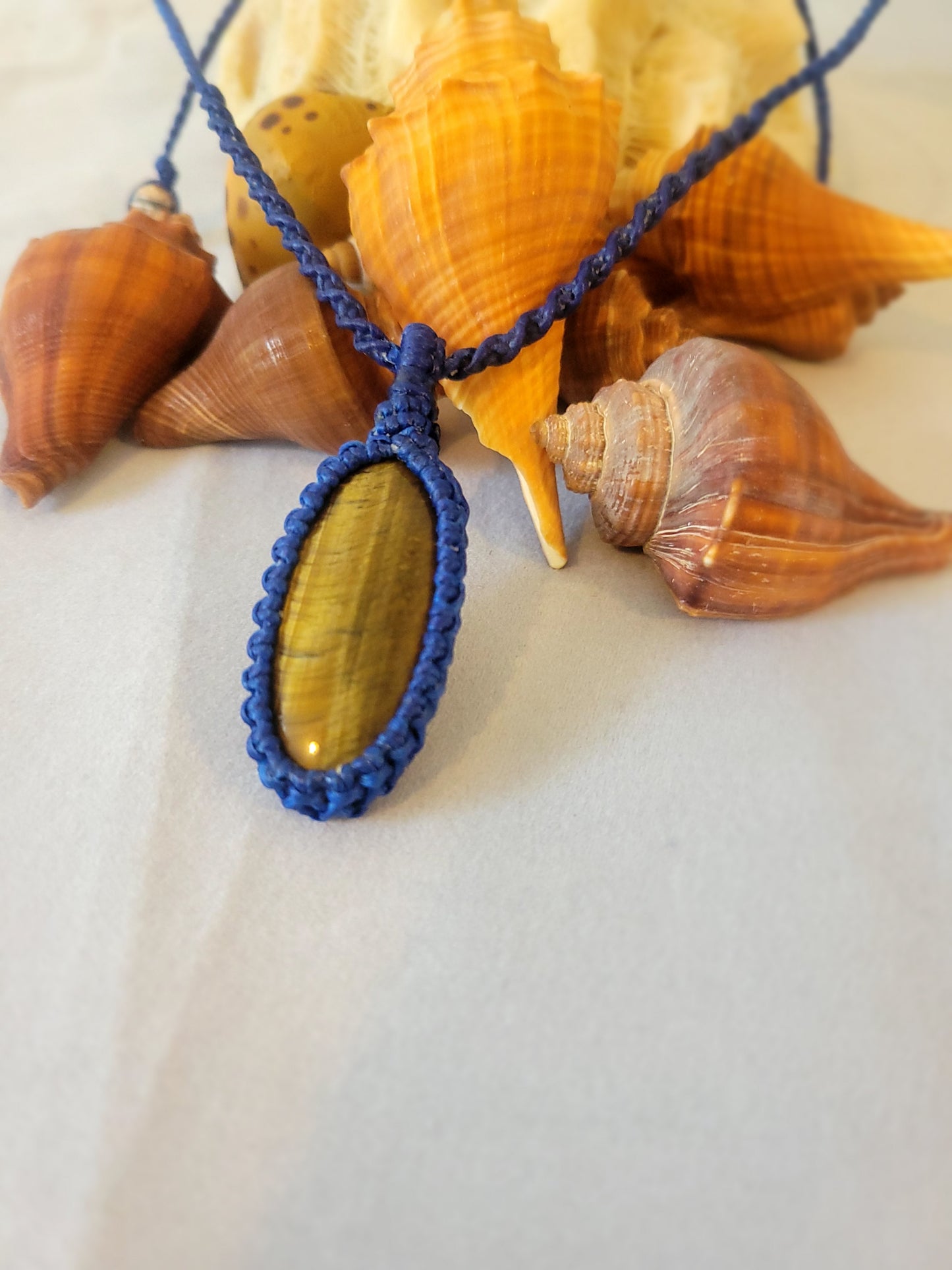 “Skyline Strength” – Elongated Oval Tiger Eye Pendant, Blue Cord, Minimalist Adjustable Necklace