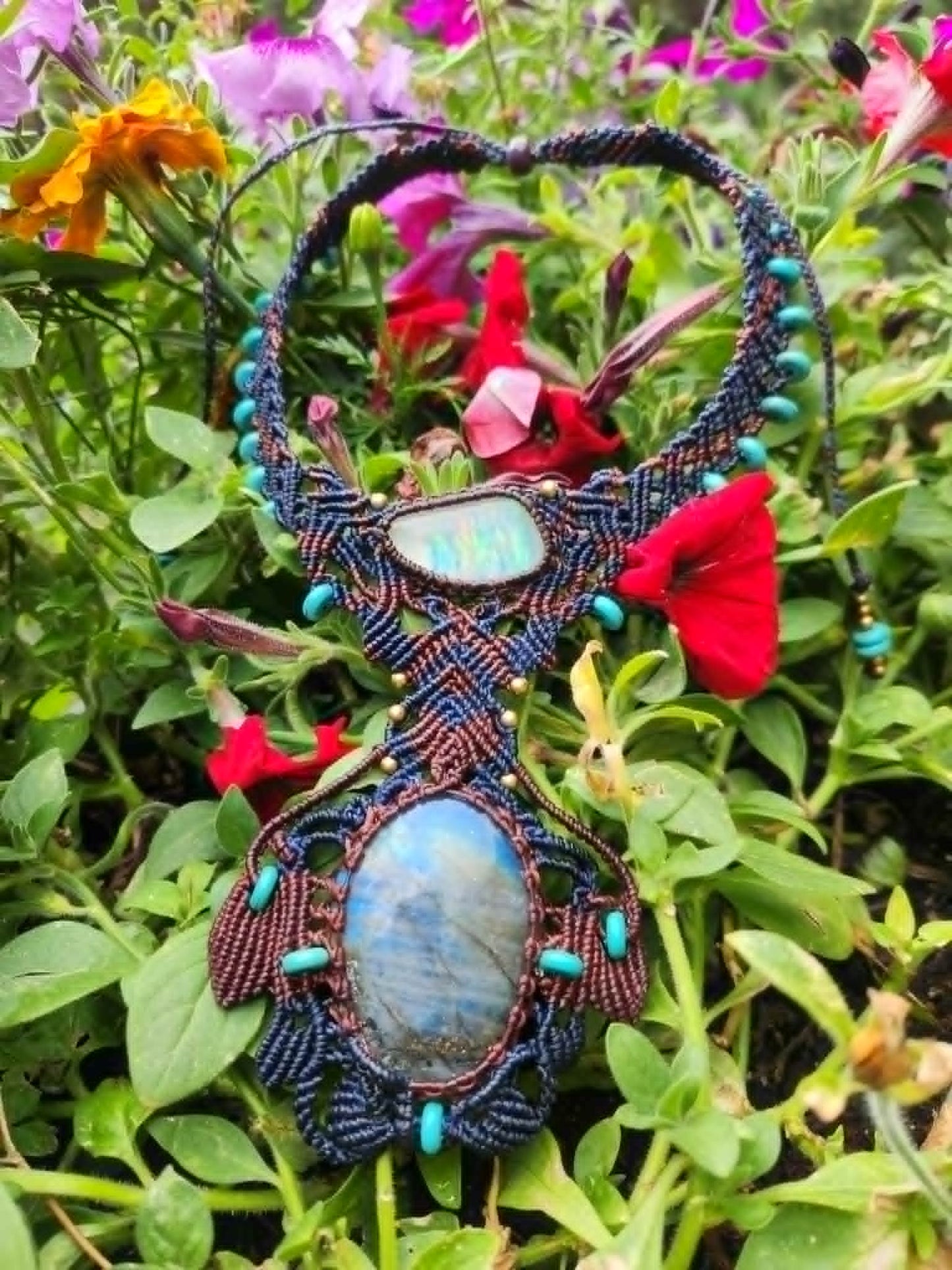 Labradorite Pendant showcasing a large gemstone centerpiece with opal slice, intricate micromacramé, and colorful accents.