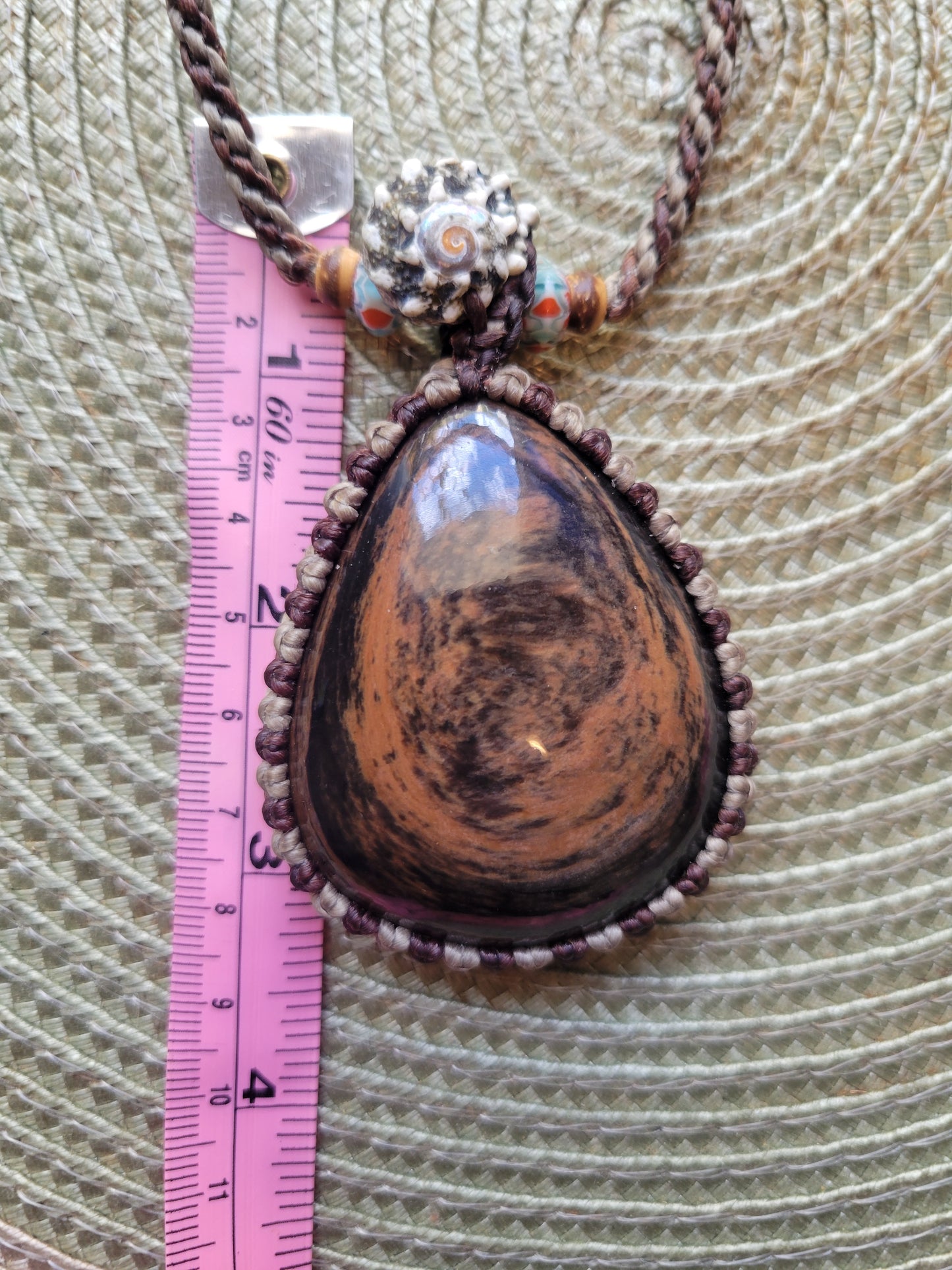 “Roots & Tides” – Mahogany Obsidian Pendant Necklace with Spiral Shell and Stone Beads, Adjustable Earth-Tone Cord