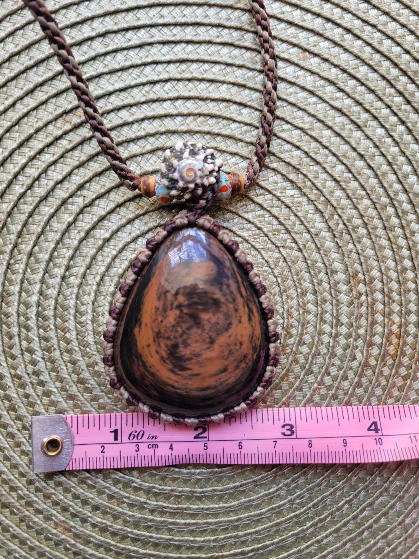 “Roots & Tides” – Mahogany Obsidian Pendant Necklace with Spiral Shell and Stone Beads, Adjustable Earth-Tone Cord