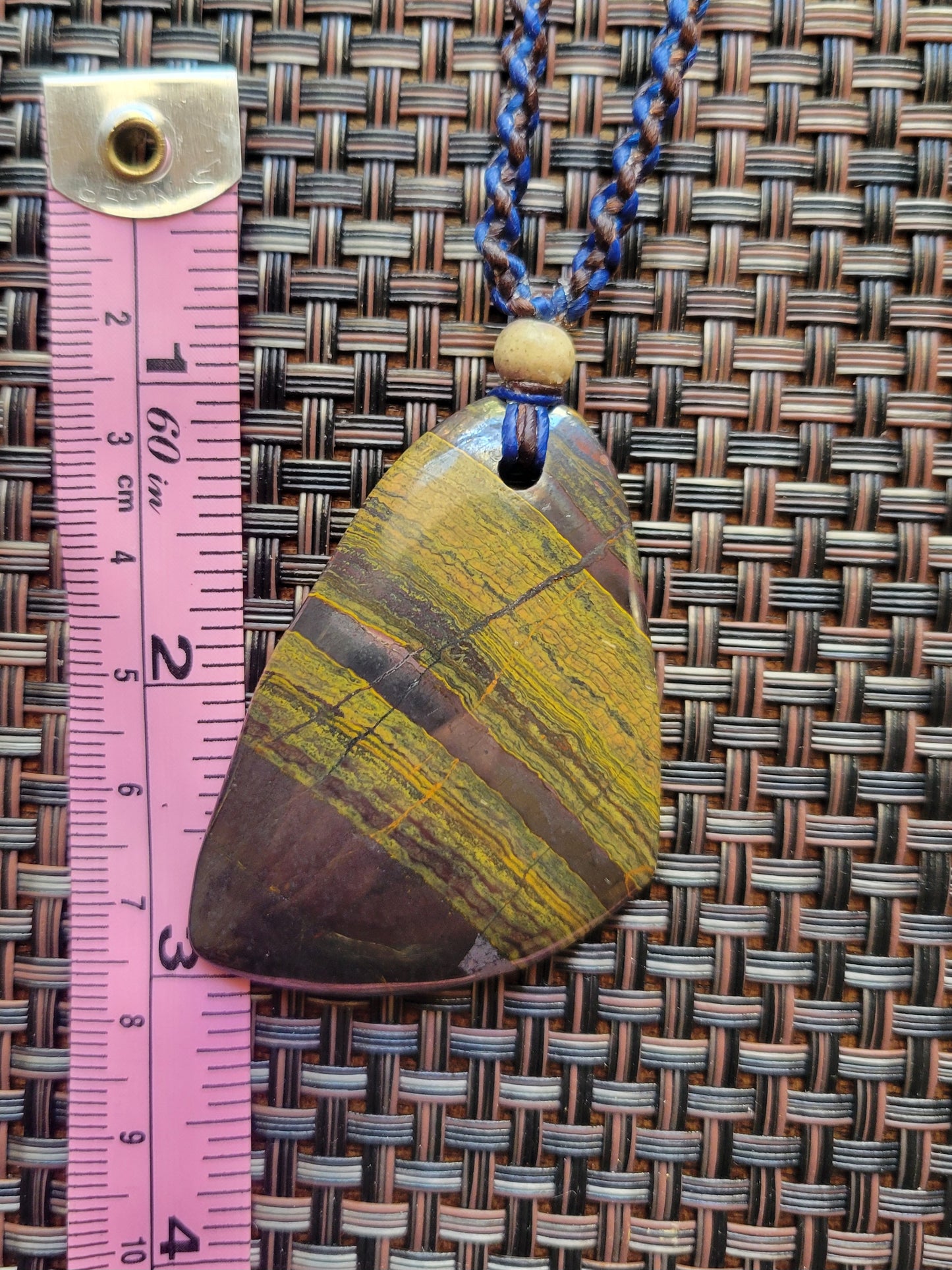 “Strength in Stillness” – Iron Tiger Eye Pendant Necklace, Blue Cord with Clear Quartz Beads, Adjustable
