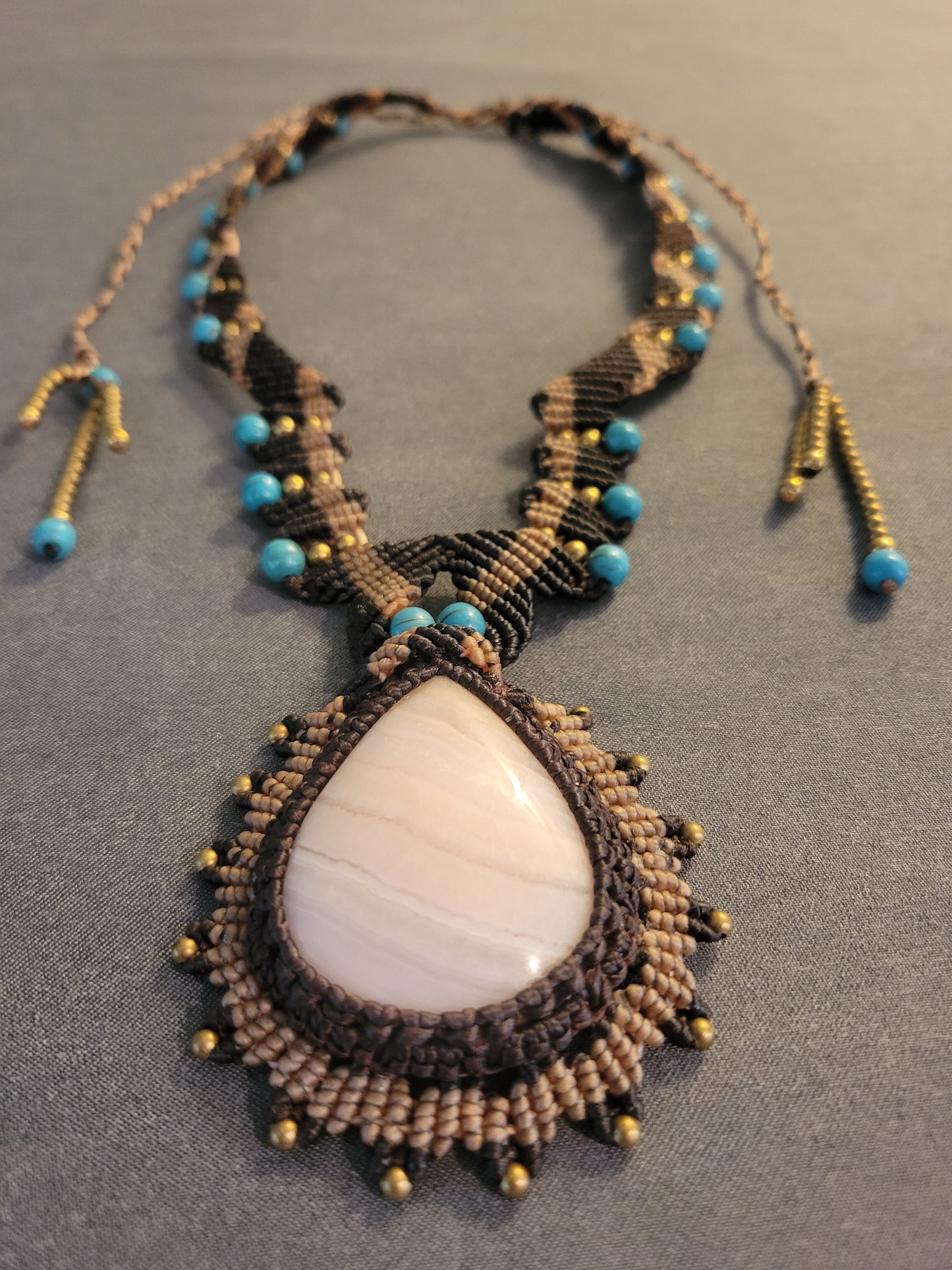 Ornate Pink Calcite Pendant Necklace – Elegant Macramé with Brass & Turquoise Accents