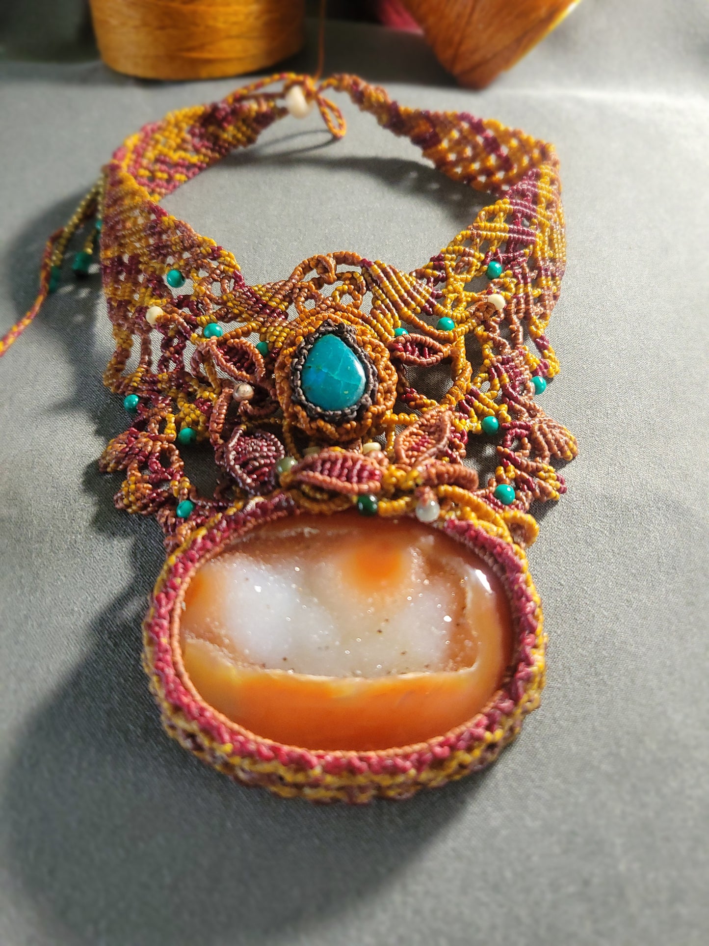 Carnelian Agate Pendant – Tribal Goddess Statement Choker featuring large carnelian druzy stone and macramé design.