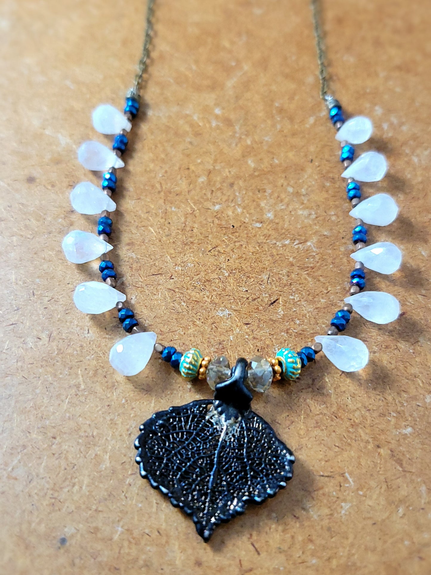Copper Leaf Pendant Necklace with Quartz and Aura Titanium accents