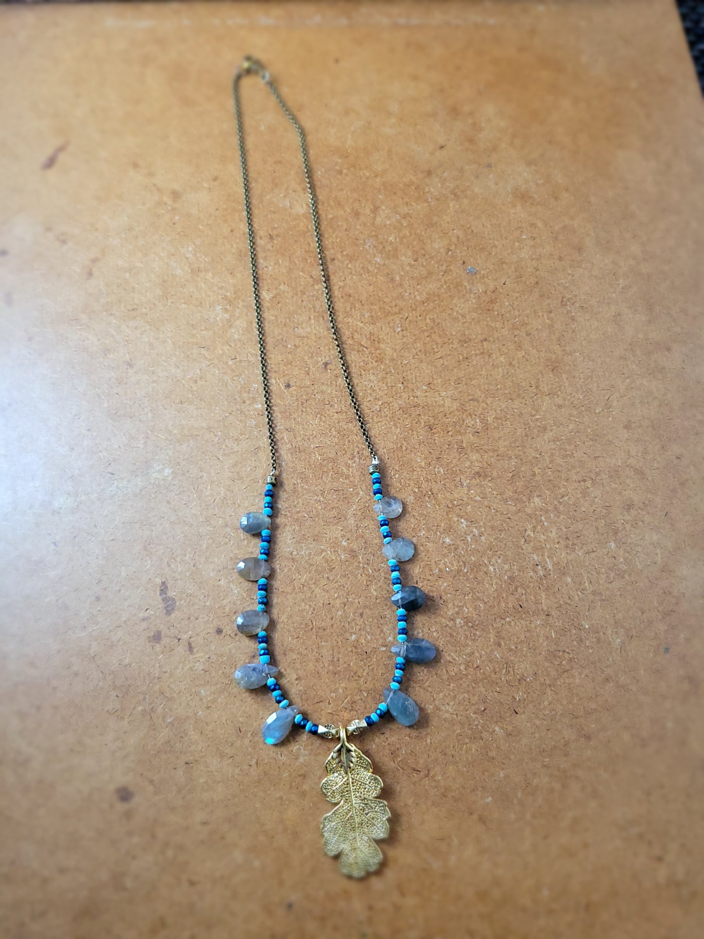 Boho Brass Leaf Pendant Necklace with brass chain and gemstones