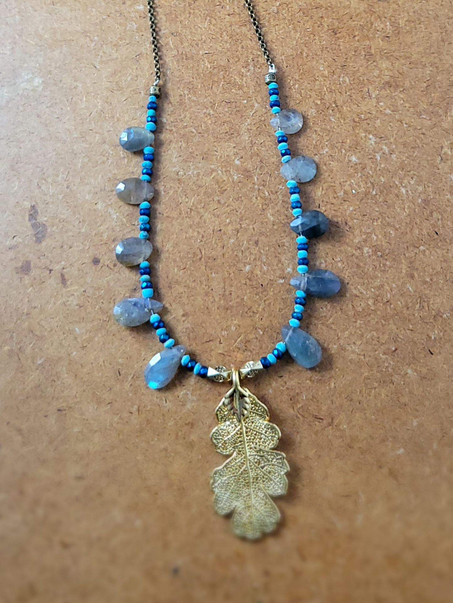 Brass Leaf Pendant Necklace with Labradorite and Aura Titanium accents