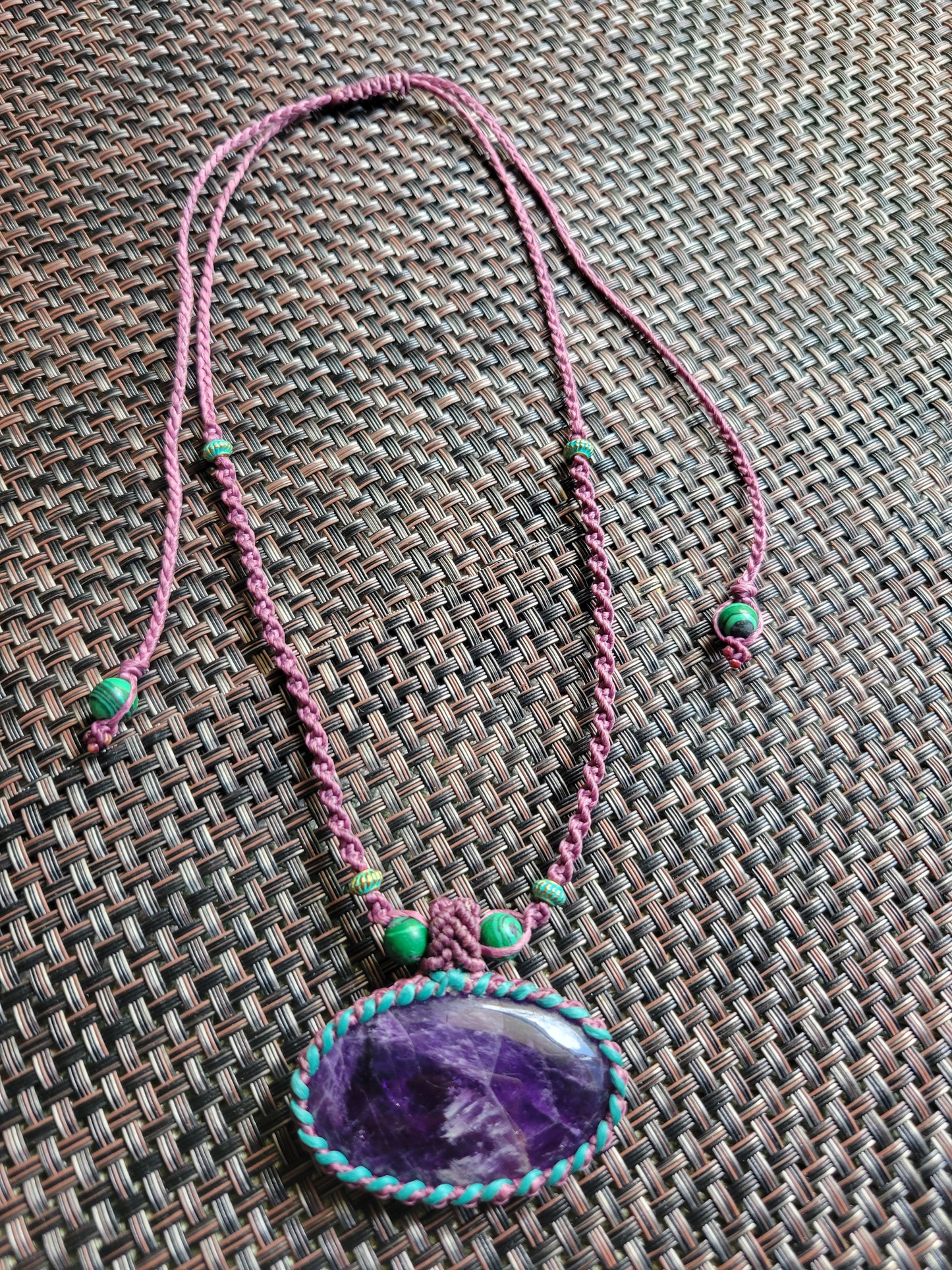 Amethyst Pendant Necklace with braided cord and spiritual design