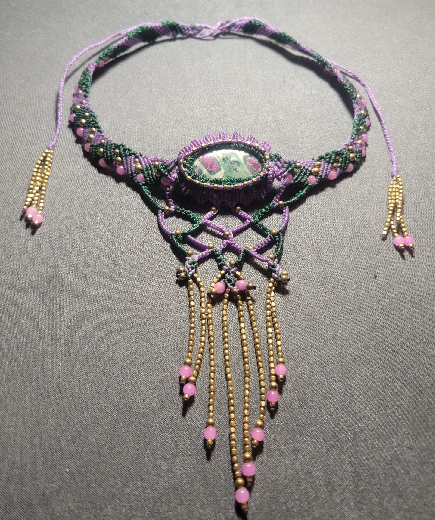 Ruby Zoisite – Handmade boho choker featuring pink accents and antique brass beads.