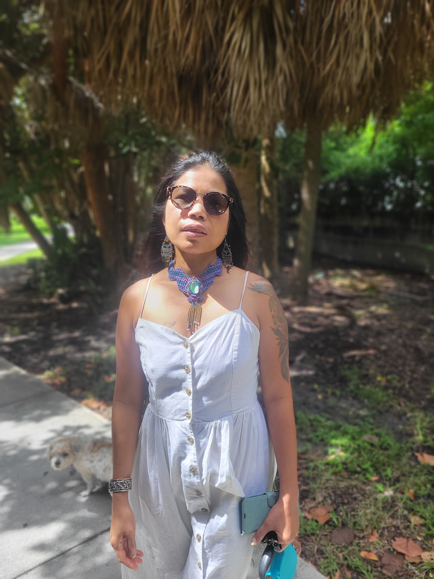 Opal Choker – Blue & Purple Handmade Boho Necklace worn by a woman in a sunny outdoor setting.