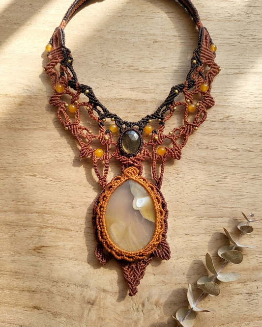 Agate Pendant featuring natural agate stone in macramé design, handmade ocean-inspired jewelry.