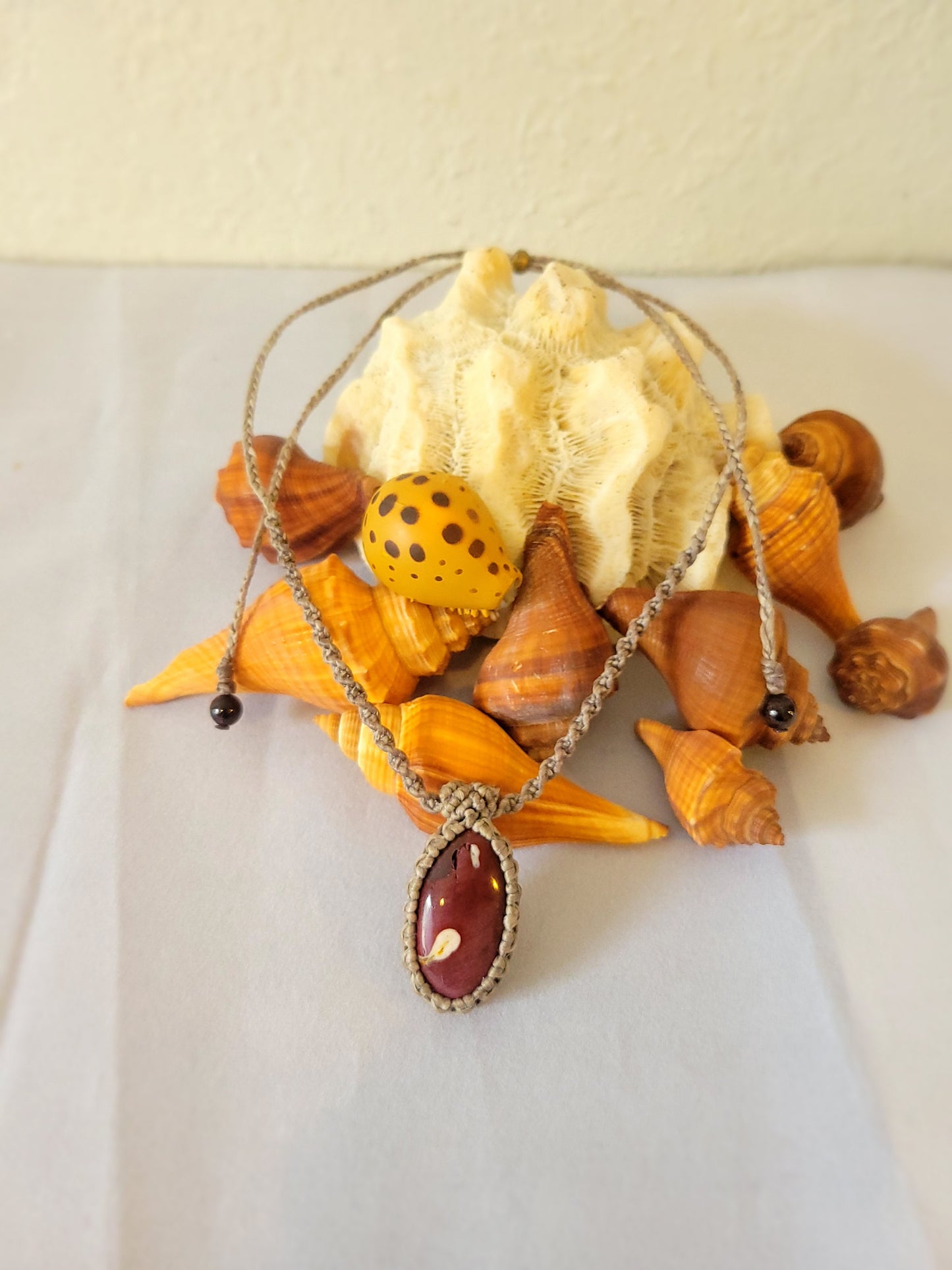 “Ember Flow” – Blood Red River Jasper Pendant Necklace, Spiral Braided Earth-Tone Cord, Minimalist Boho Unisex