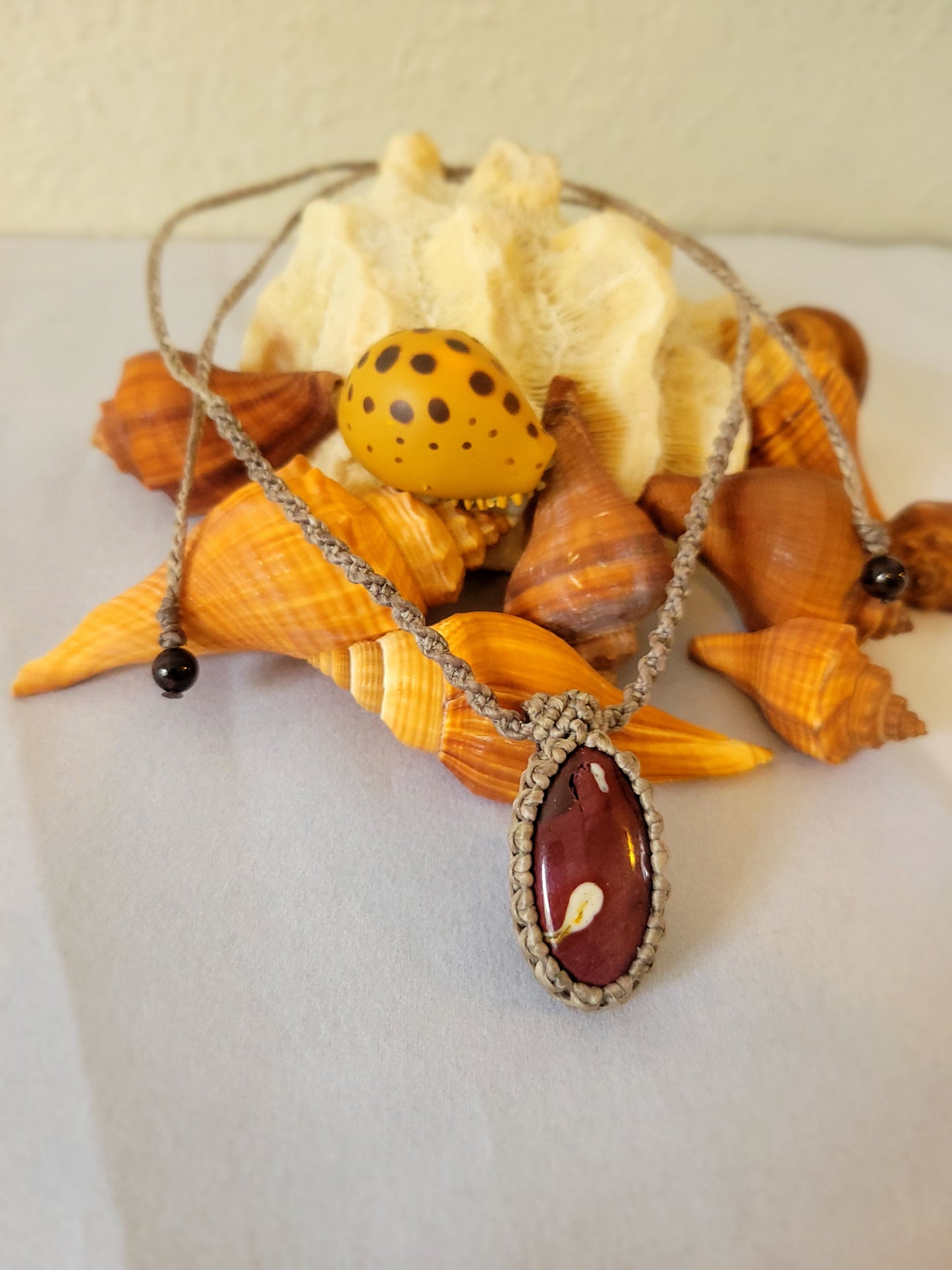 “Ember Flow” – Blood Red River Jasper Pendant Necklace, Spiral Braided Earth-Tone Cord, Minimalist Boho Unisex