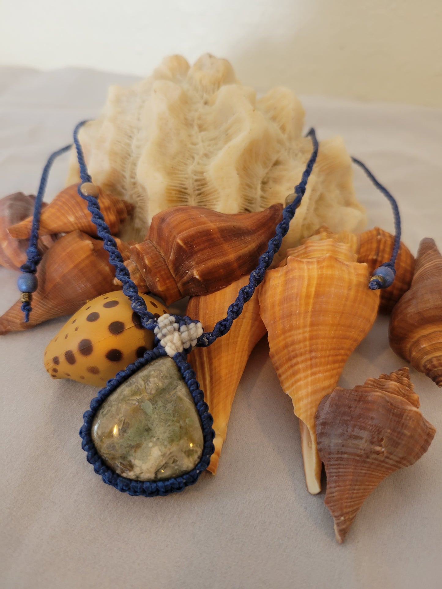 Mist Over Canopy” – Rainforest Rhyolite Pendant Necklace, Blue Cord with White Accents, Adjustable