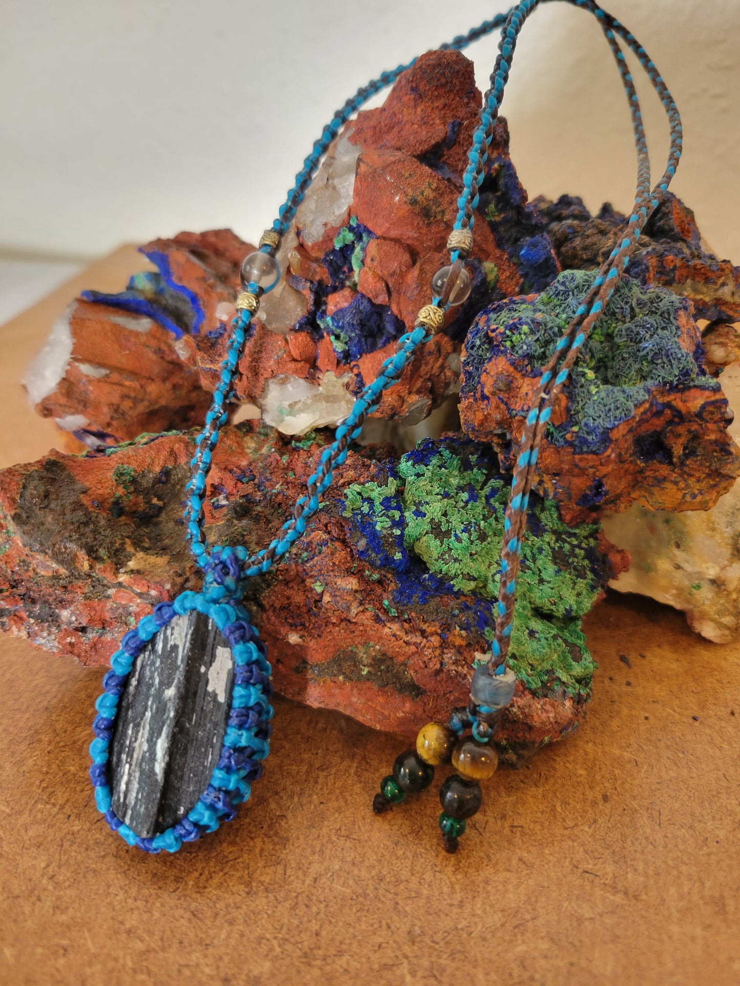 Midnight Elegance: Black Tourmaline Pendant in Blue Cord with Monochrome Beads