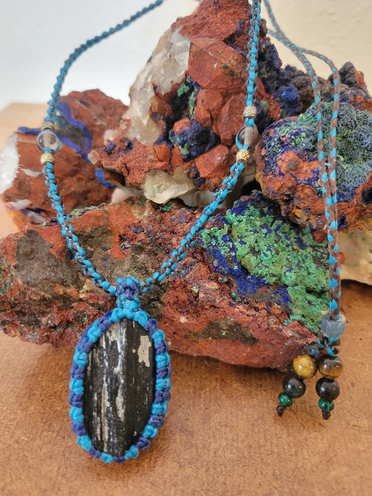 Midnight Elegance: Black Tourmaline Pendant in Blue Cord with Monochrome Beads