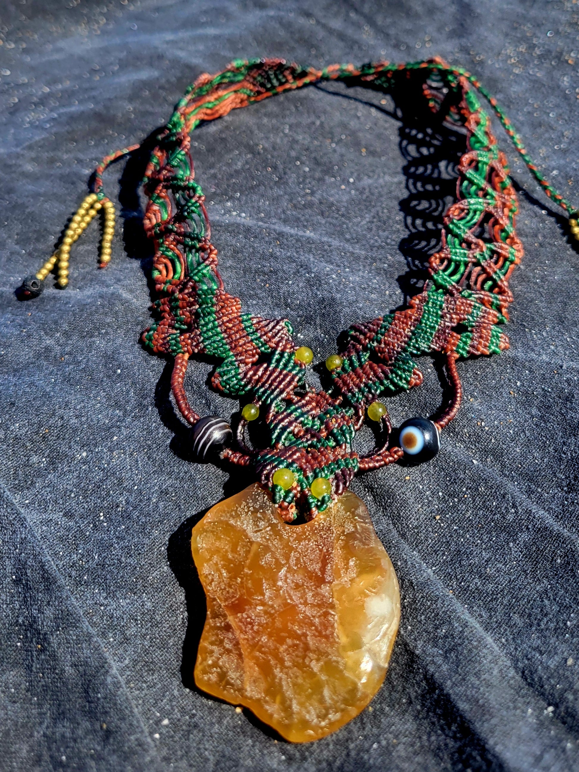 Honey Carnelian Agate raw stone boho choker necklace with intricate micromacramé design and geometric knot patterns.