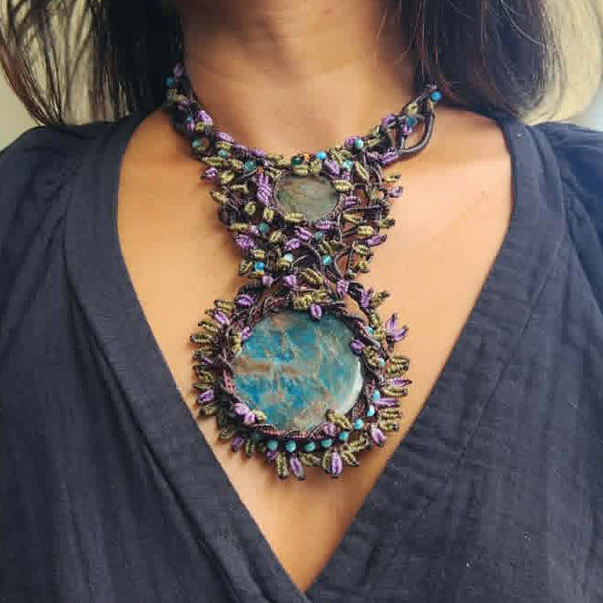 Apatite Pendant featuring a large blue apatite stone and intricate micromacramé design adorned with gemstone beads.