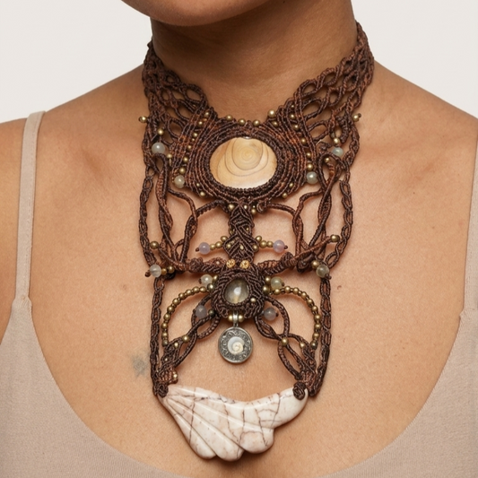 Jasper Necklace showcasing a hand-carved red vein jasper angel wing centerpiece and ornate micromacramé design.