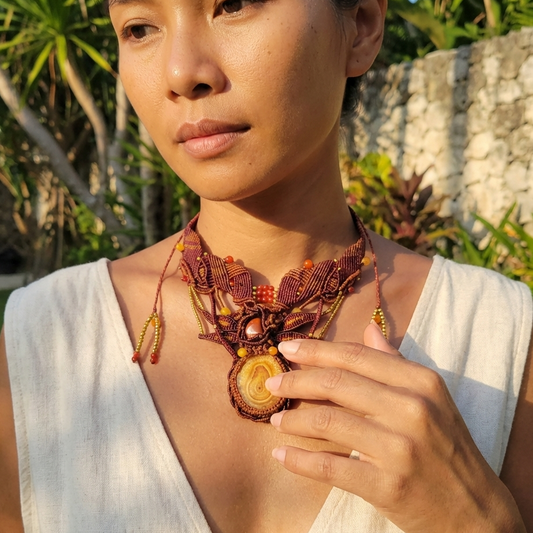 Agate Boho Necklace featuring honey yellow agate stalactite and red carnelian beads on a macramé choker.