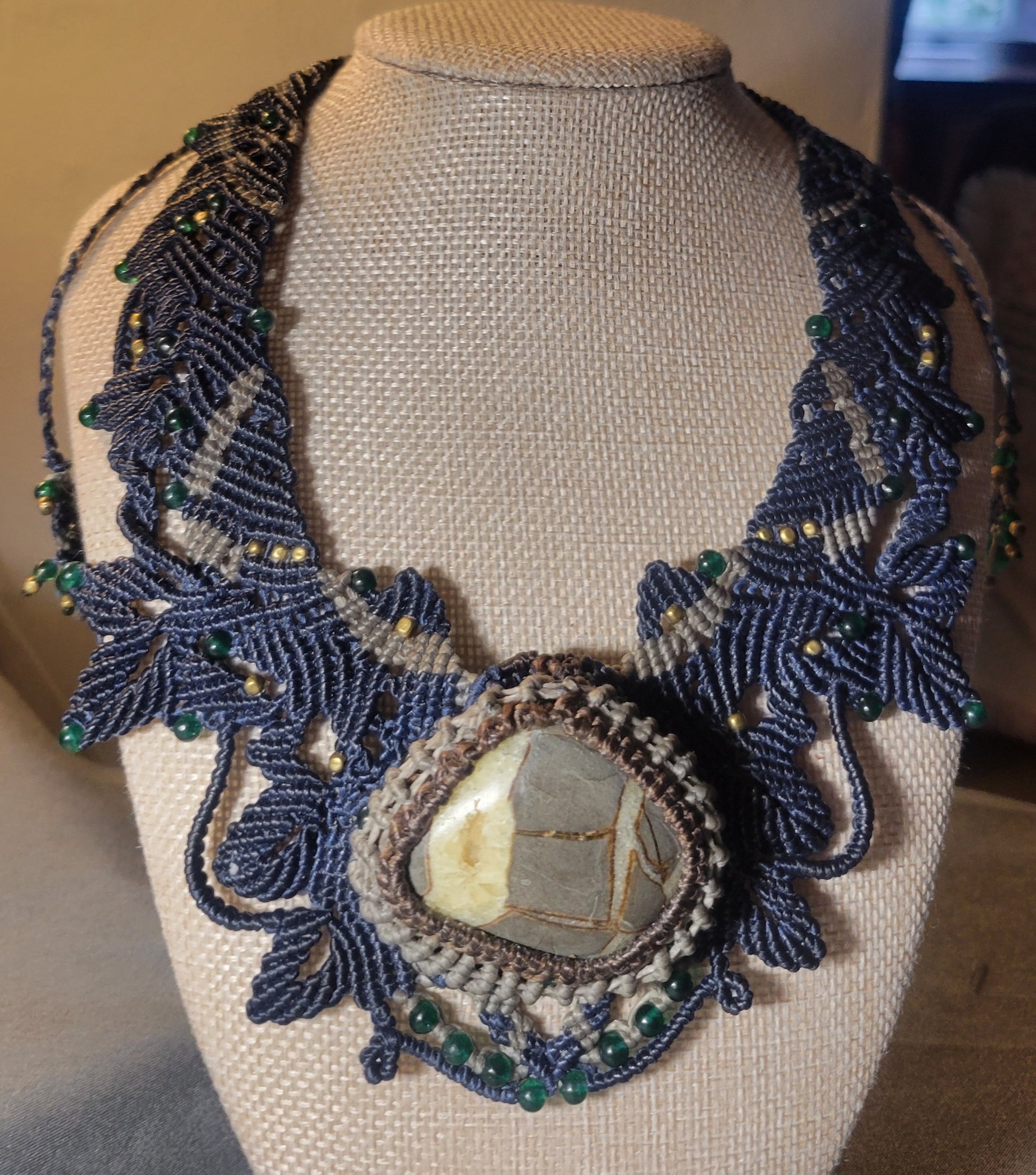 Feminine warrior-inspired necklace with dragon symbolism