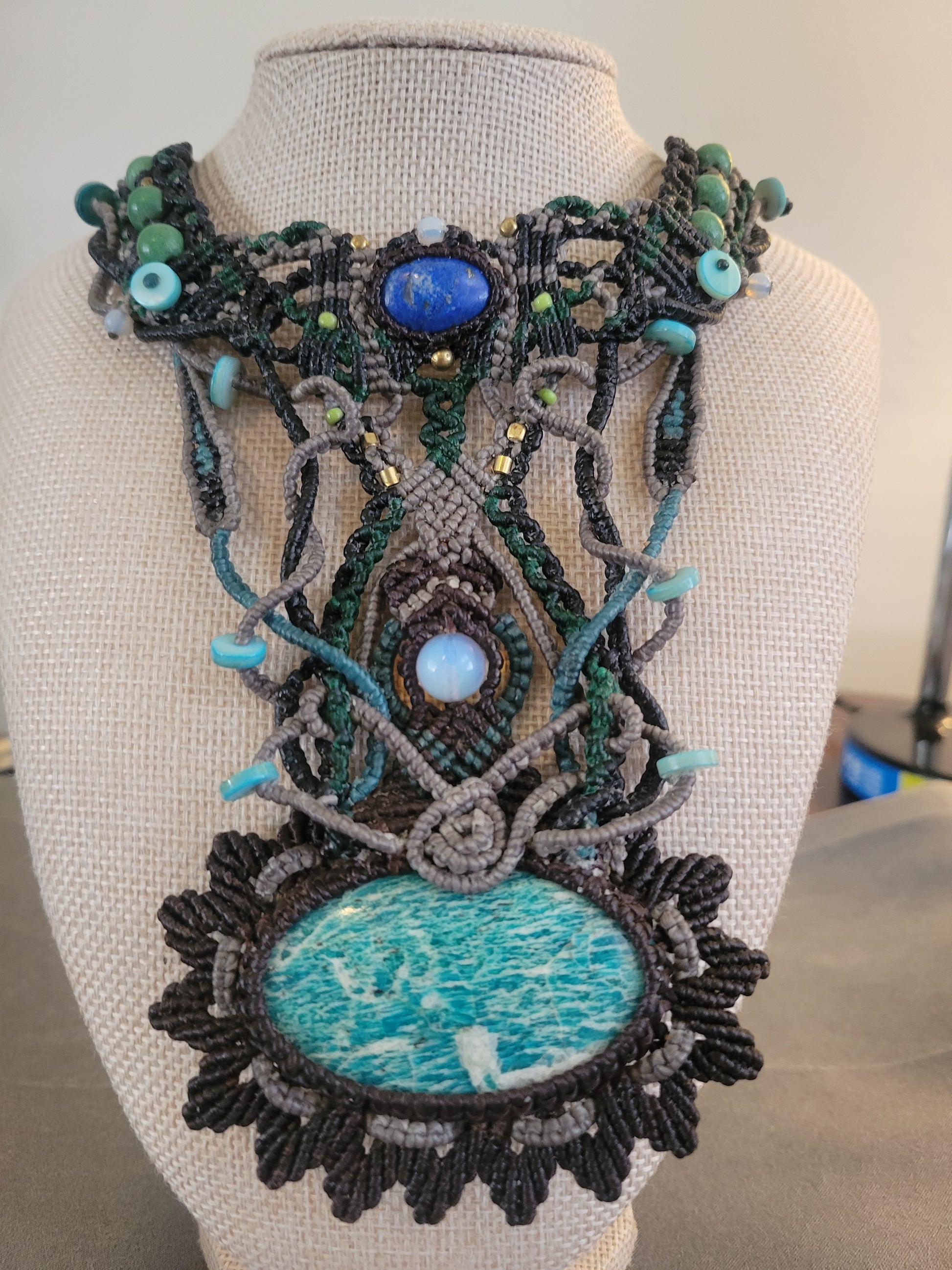 Amazonite Stone Necklace featuring intricate macramé design, large natural pendant, and mixed bead accents.