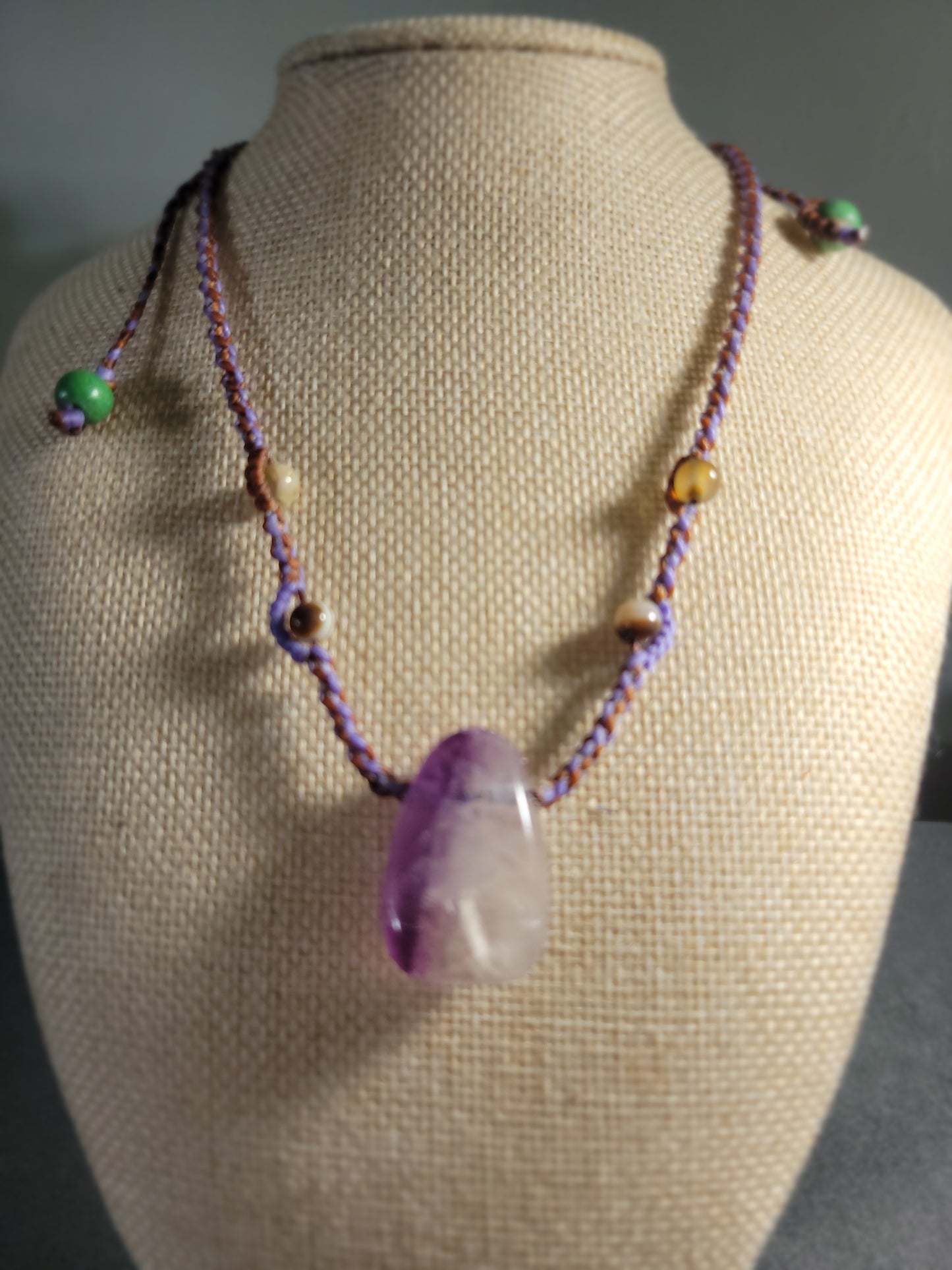 Amethyst Necklace – Minimalist Boho Hippie Braided Cord featuring polished amethyst and colorful bead accents.