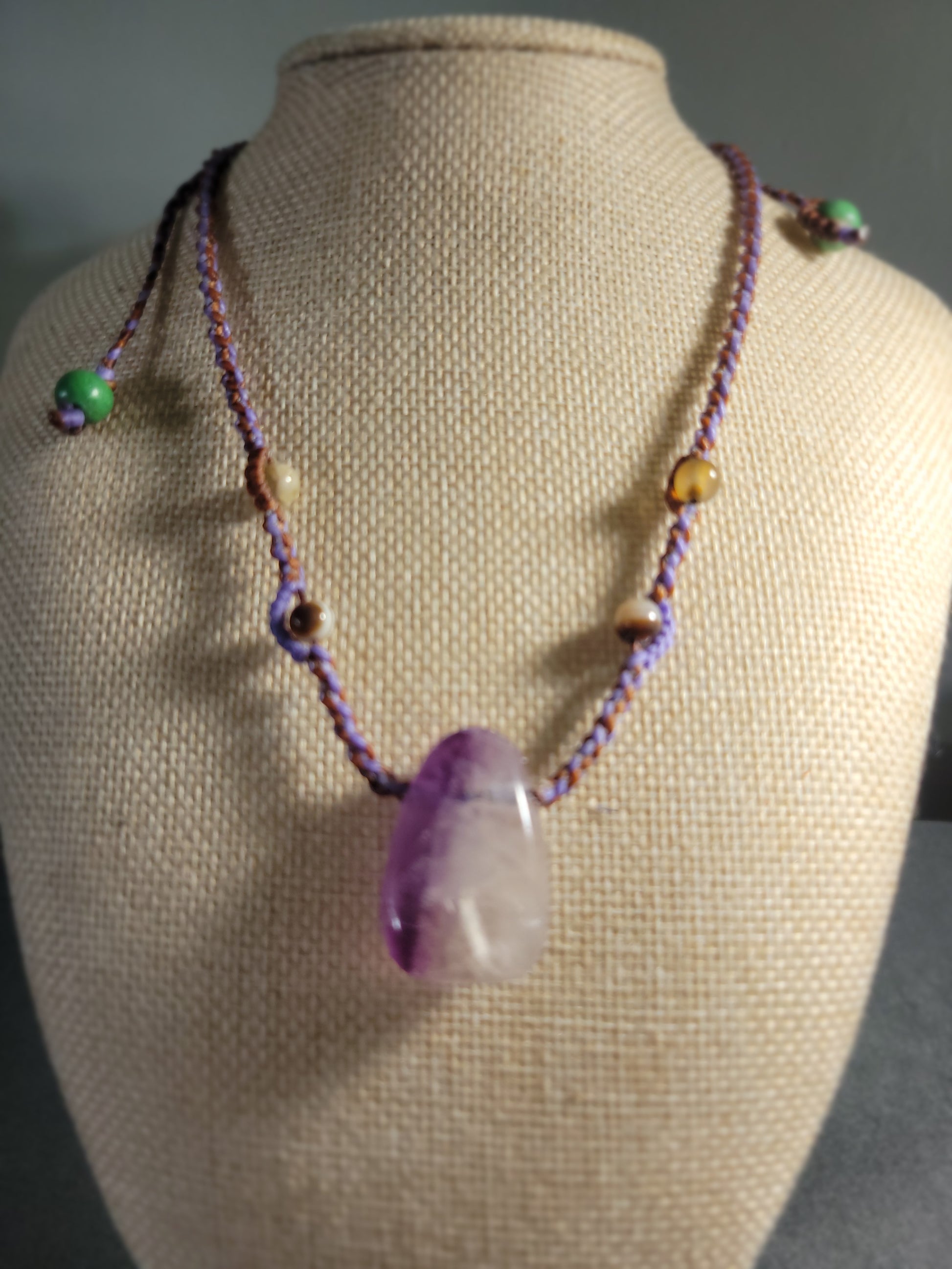 Amethyst Necklace – Minimalist Boho Hippie Braided Cord featuring polished amethyst and colorful bead accents.