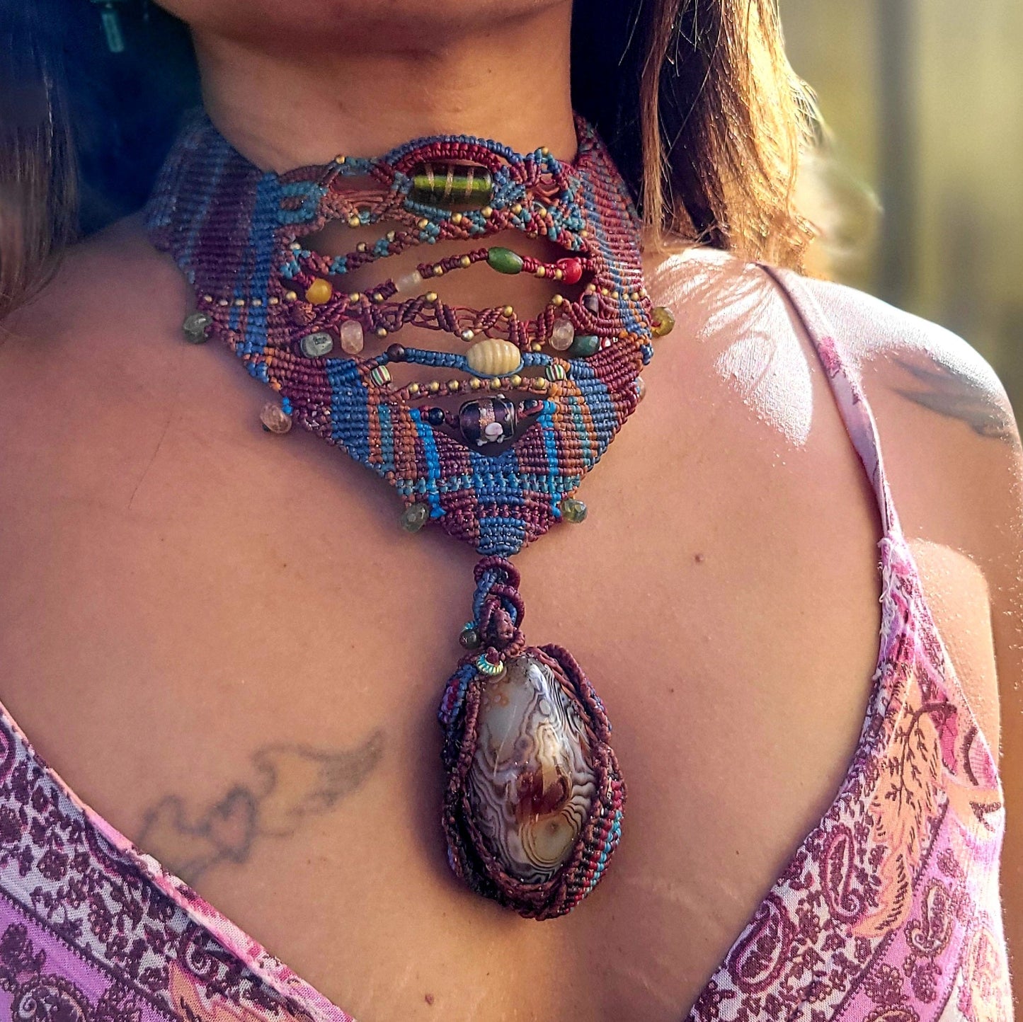 Botswana Agate Pendant showcased in a tribal medicine woman choker with colorful beads and intricate micromacramé design.
