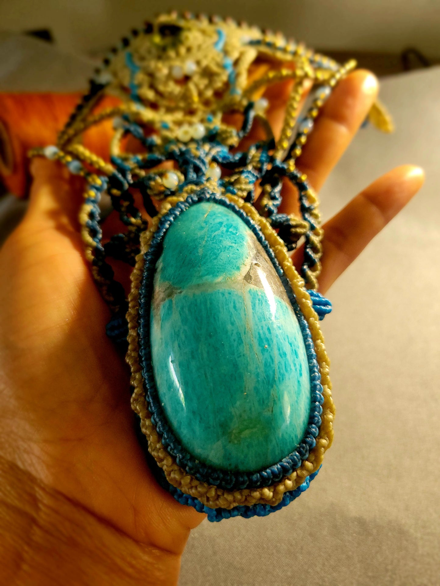 Amazonite Pendant Necklace featuring a large natural amazonite stone centerpiece and ornate micromacramé design