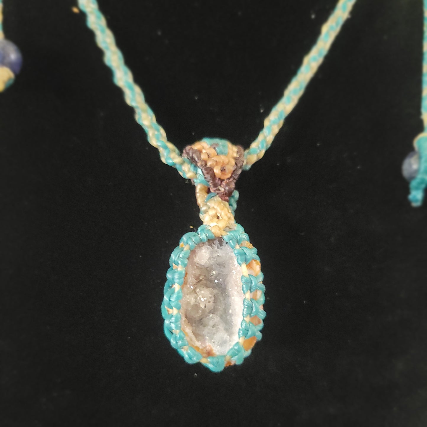 Agate Necklace featuring a natural geode pendant with aquamarine accents and handmade boho design.