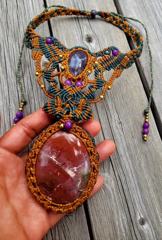 Noreena Jasper Pendant – River Through the Red Earth showcasing large natural stone and intricate micromacramé design.