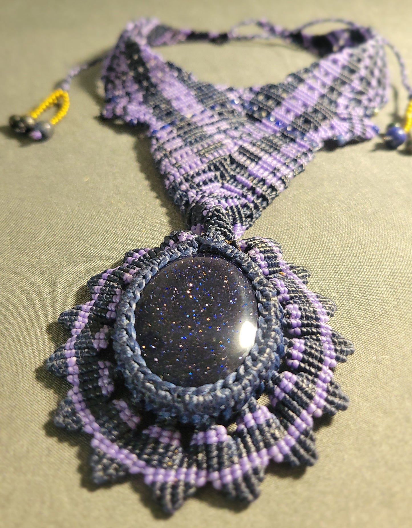 Handmade Boho Necklace – Blue Sandstone Mandala Choker featuring a blue sandstone cabochon in intricate macramé.