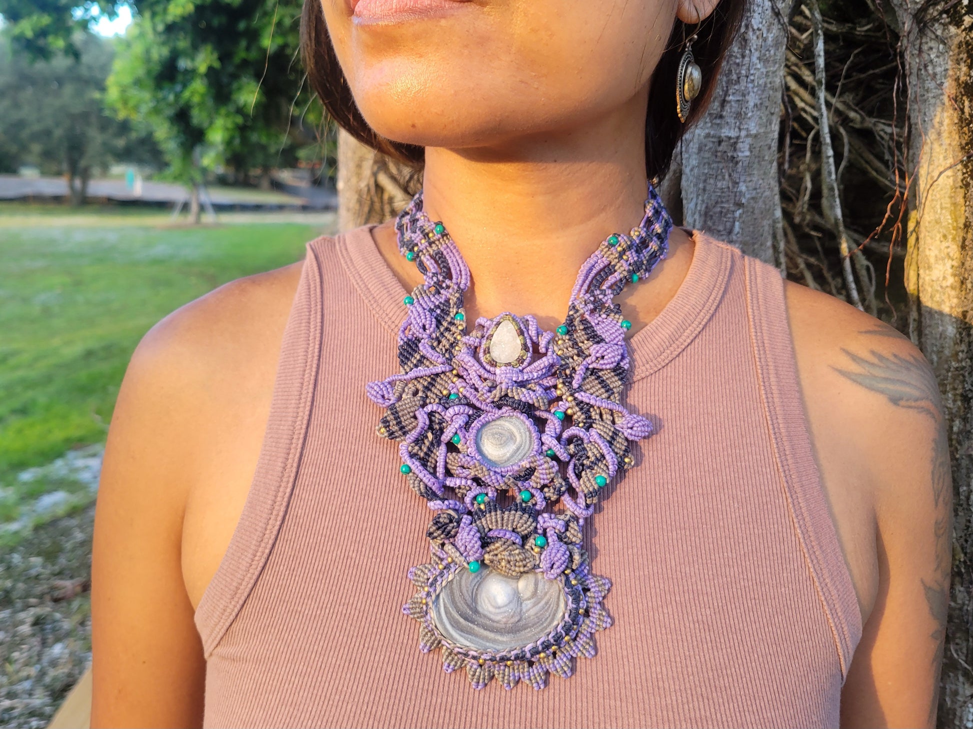 Agate Necklace featuring boho triple druzy agate breastplate design with macramé cords and antique brass beads.