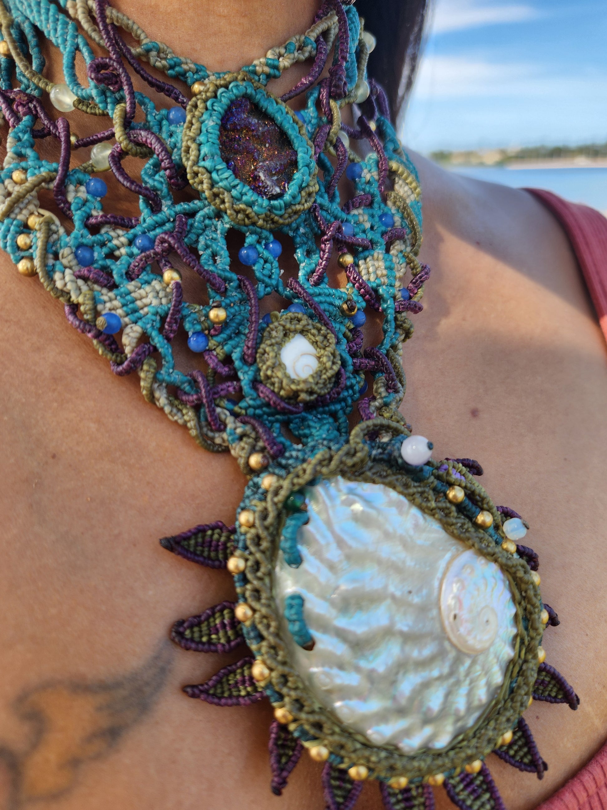Shell Pendant – Ocean Priestess Abalone Statement Choker featuring large abalone shell and colorful micromacramé design.