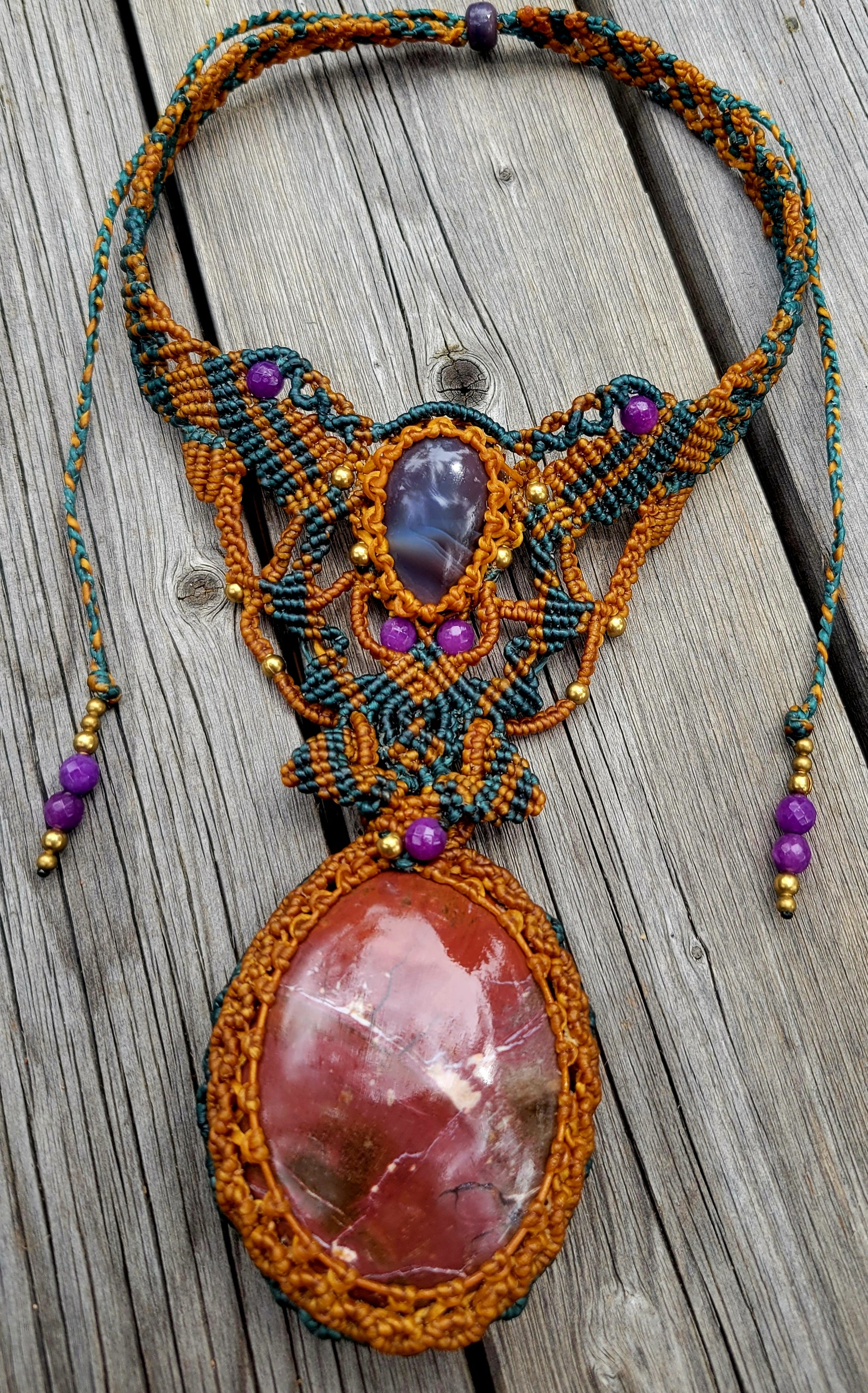 Noreena Jasper Pendant featuring large natural stone, Botswana Agate, and intricate micromacramé design.