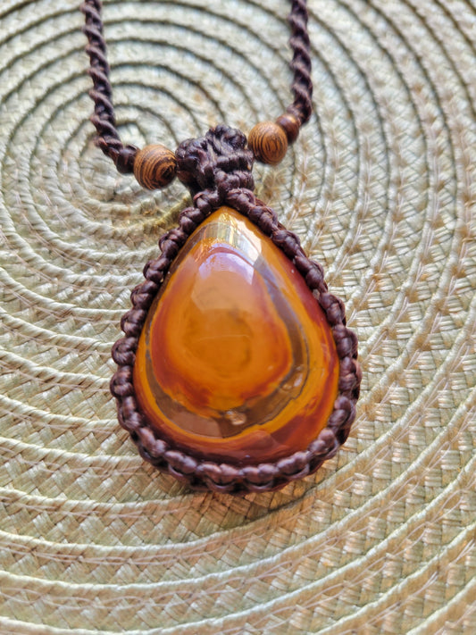 “Echoes in Stone” – Teardrop Tiger Eye Pendant Necklace with Visible Mineral Rings, Adjustable Macrame Wrap