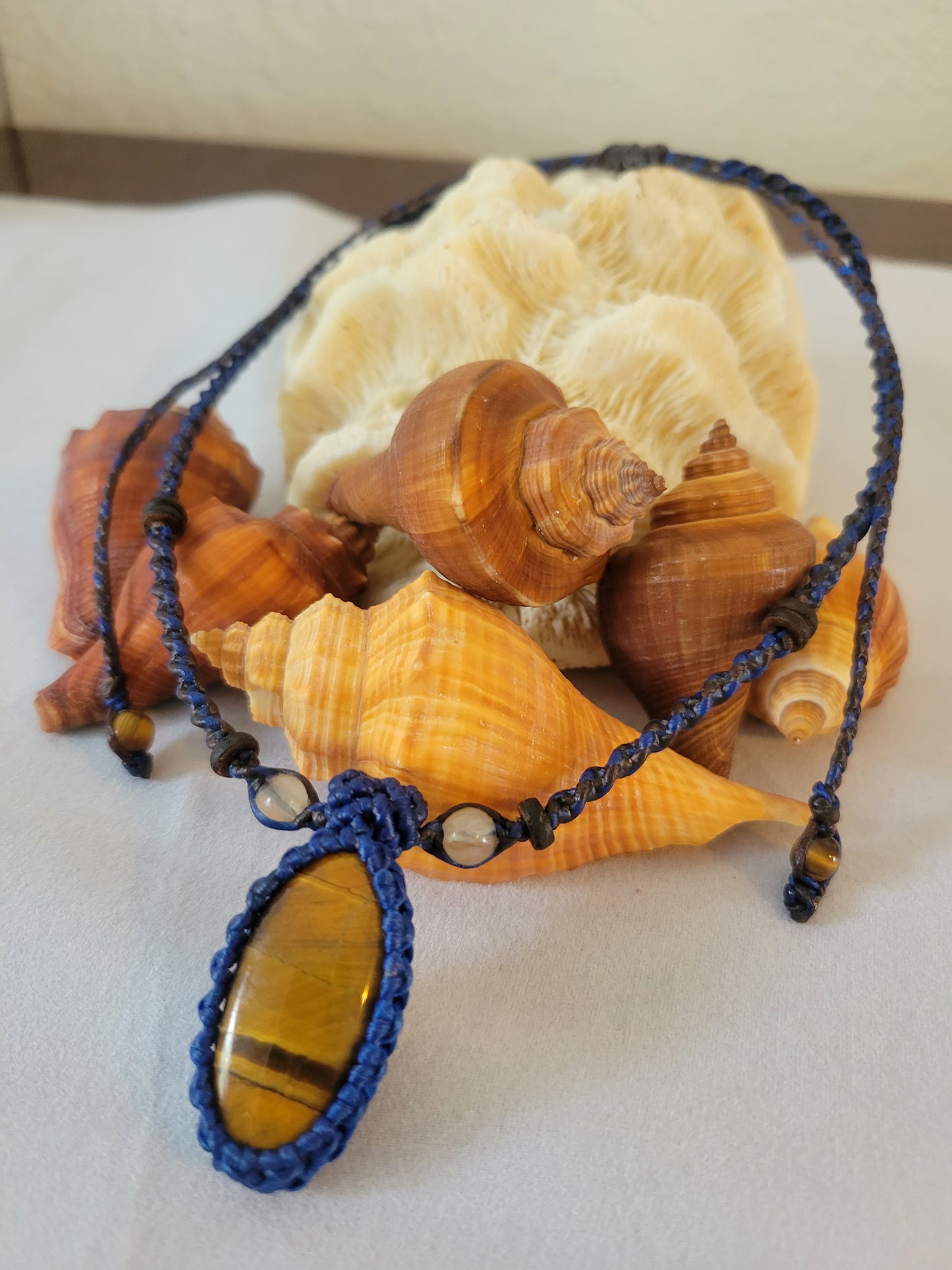 “Clarity & Courage” – Oval Tiger Eye Pendant Necklace with Clear Quartz Beads, Blue Cord, Adjustable