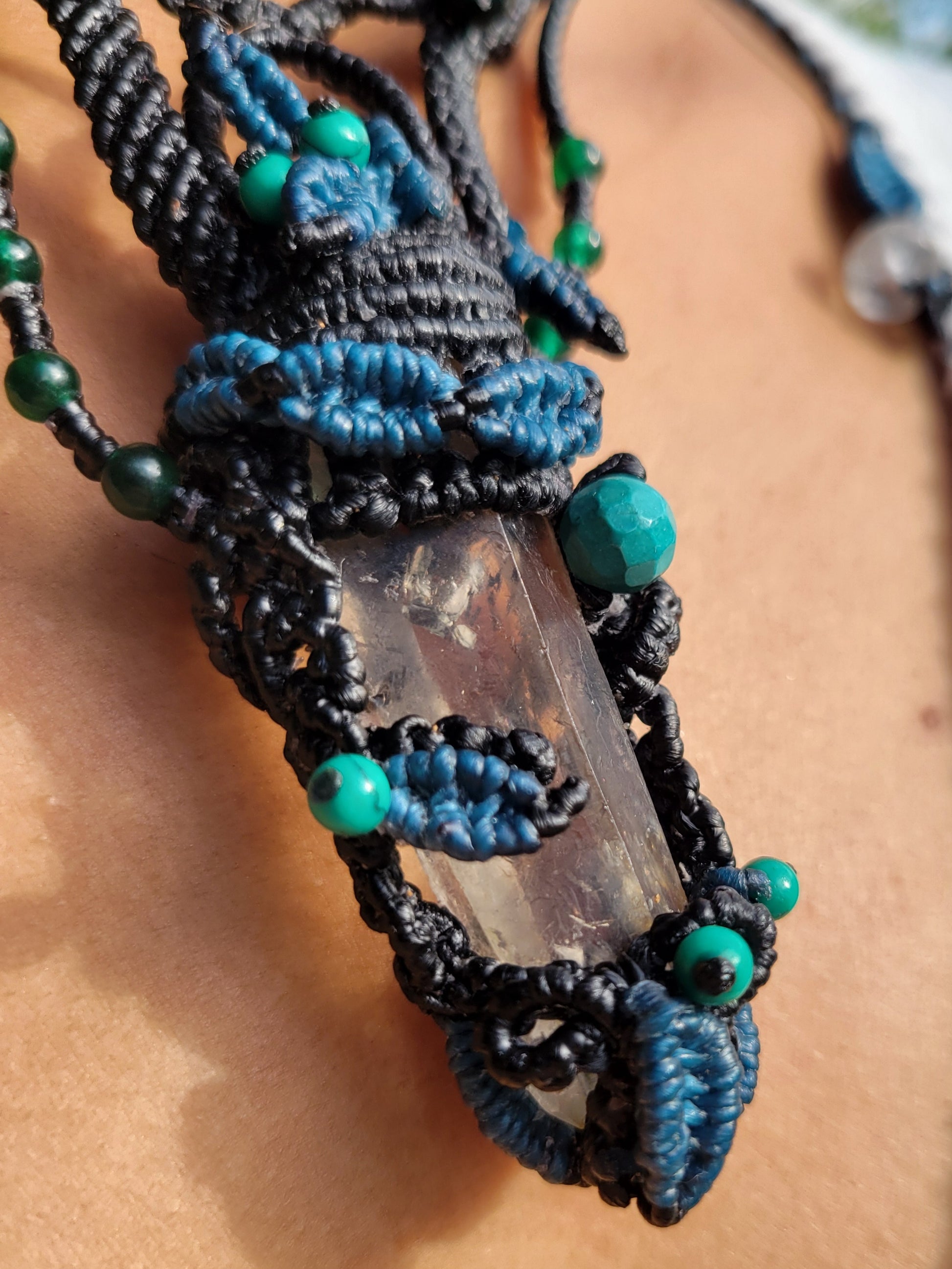 Boho quartz crystal necklace with blue macramé leaves