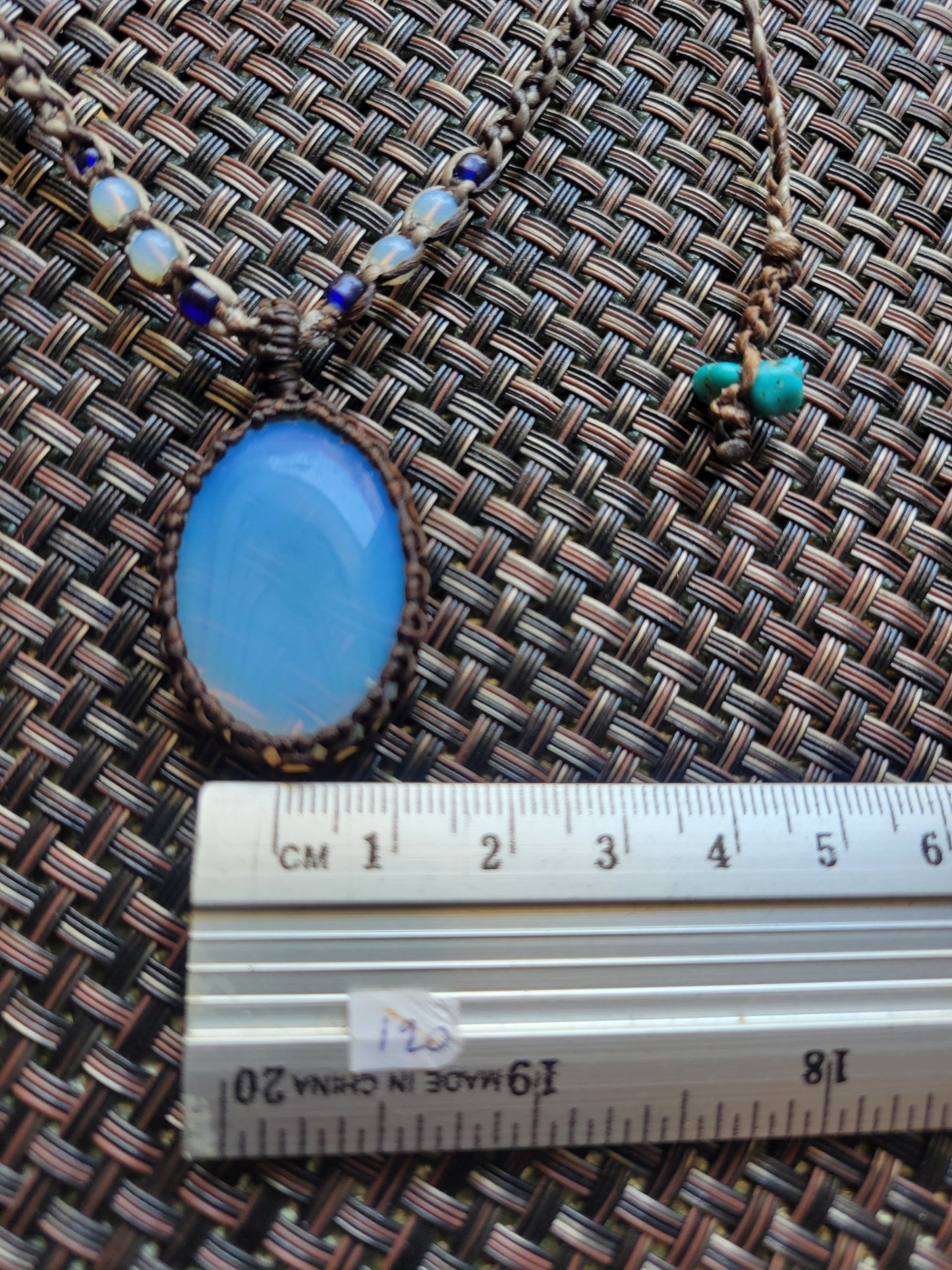 Opalite Pendant showcased in a minimalist boho adjustable necklace with micromacramé wrapping and bead details.