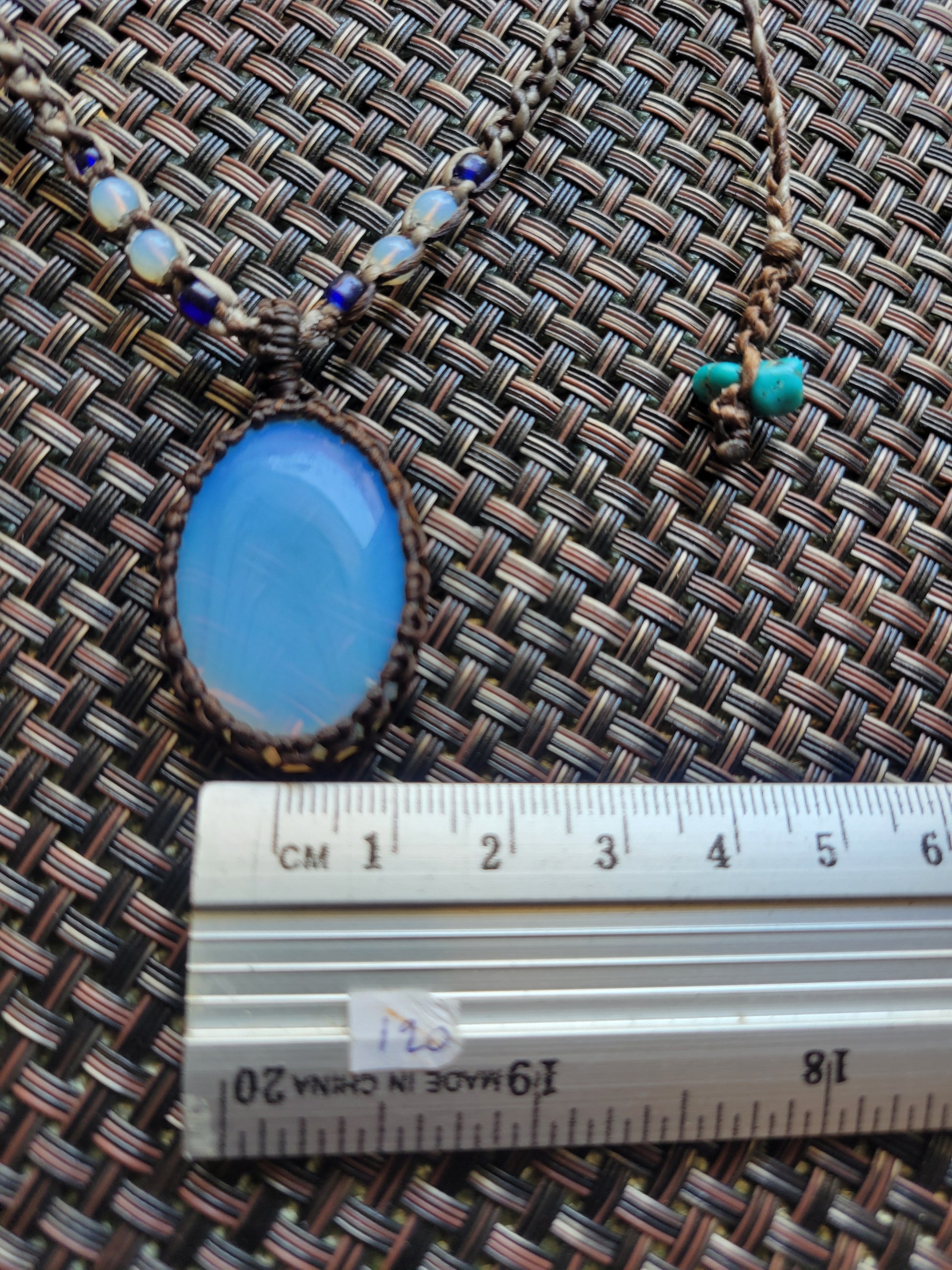 Opalite Pendant showcased in a minimalist boho adjustable necklace with micromacramé wrapping and bead details.