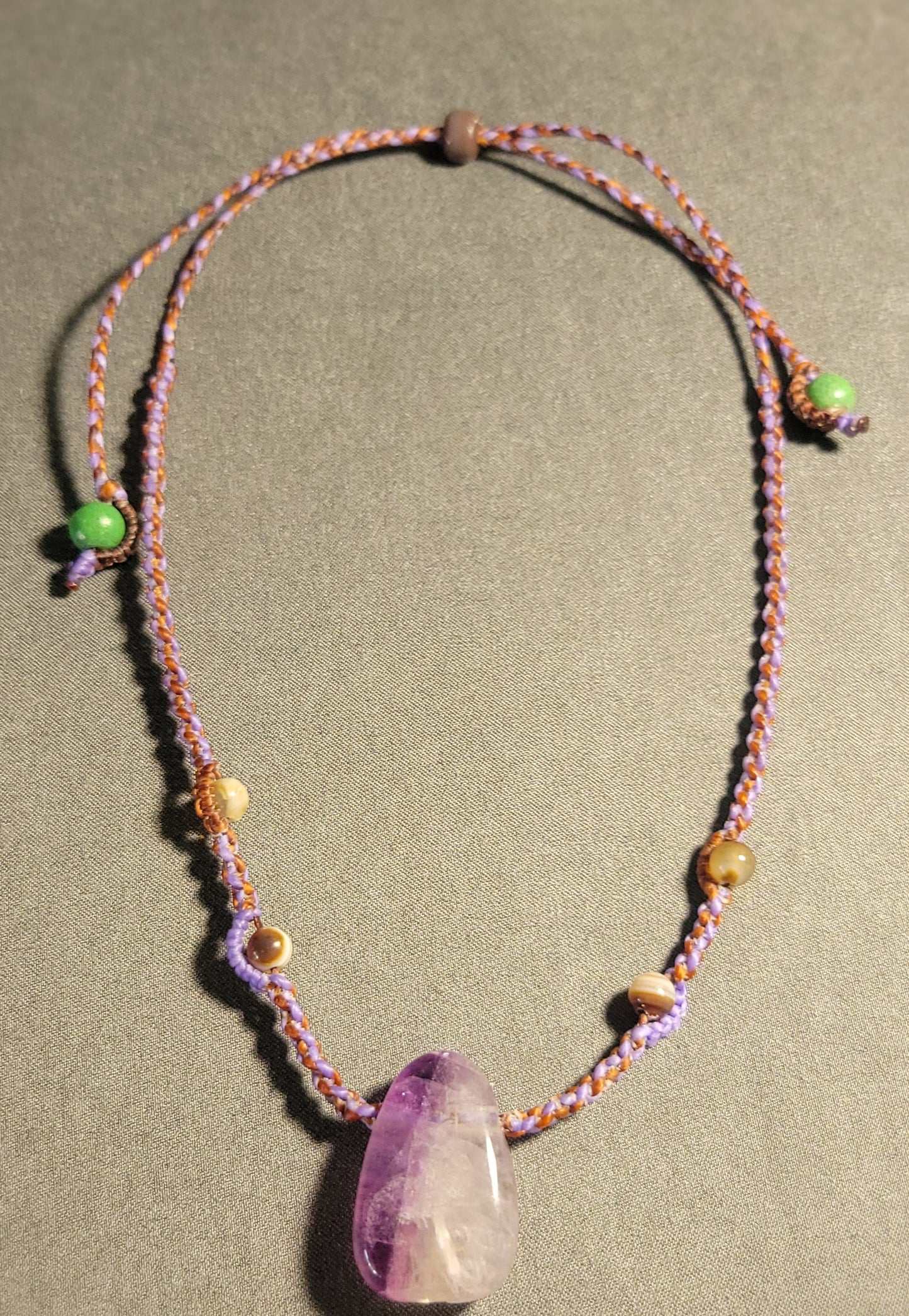 Amethyst Necklace – Minimalist Boho Hippie Braided Cord with small polished amethyst gemstone and colorful accents.