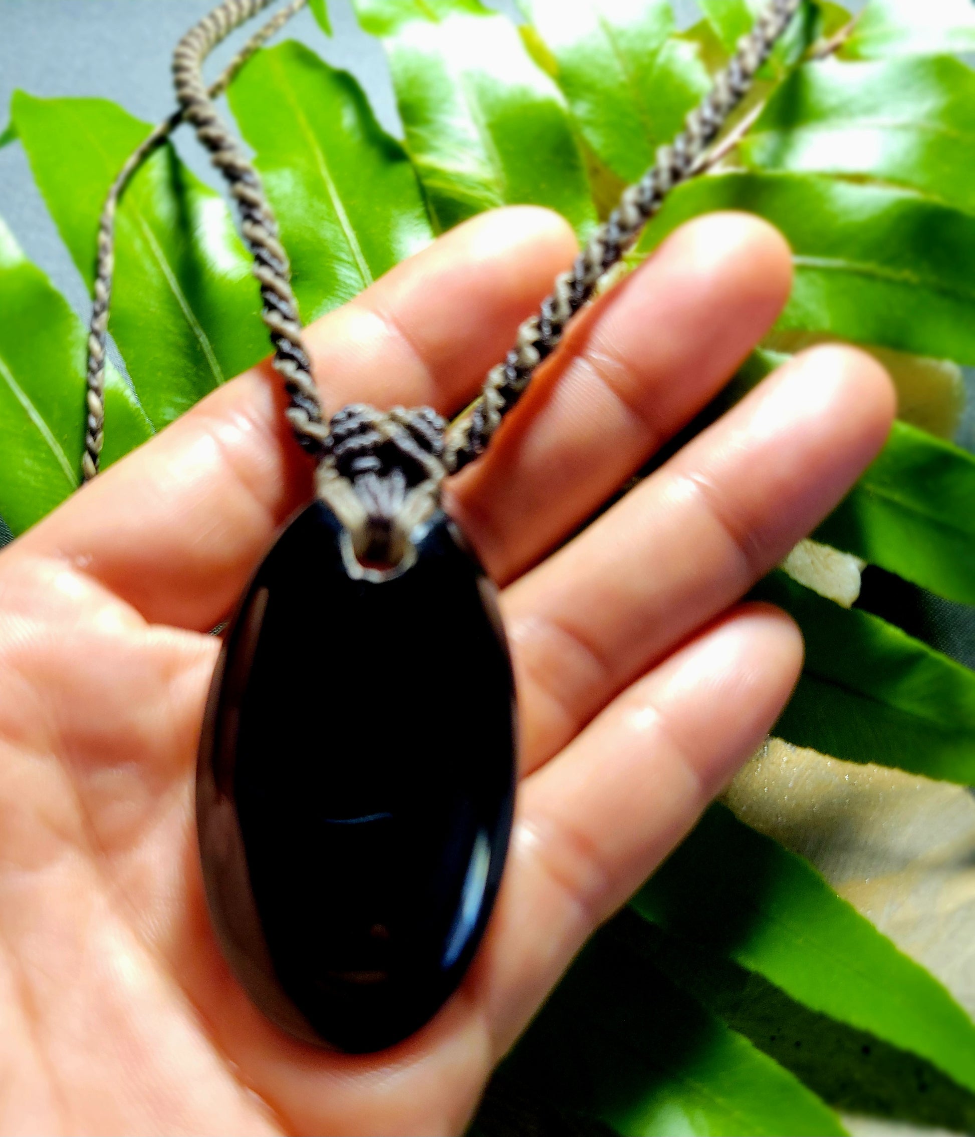 Black Onyx Necklace – Midnight Wanderer Talisman with natural oval black onyx stone on macramé cord.