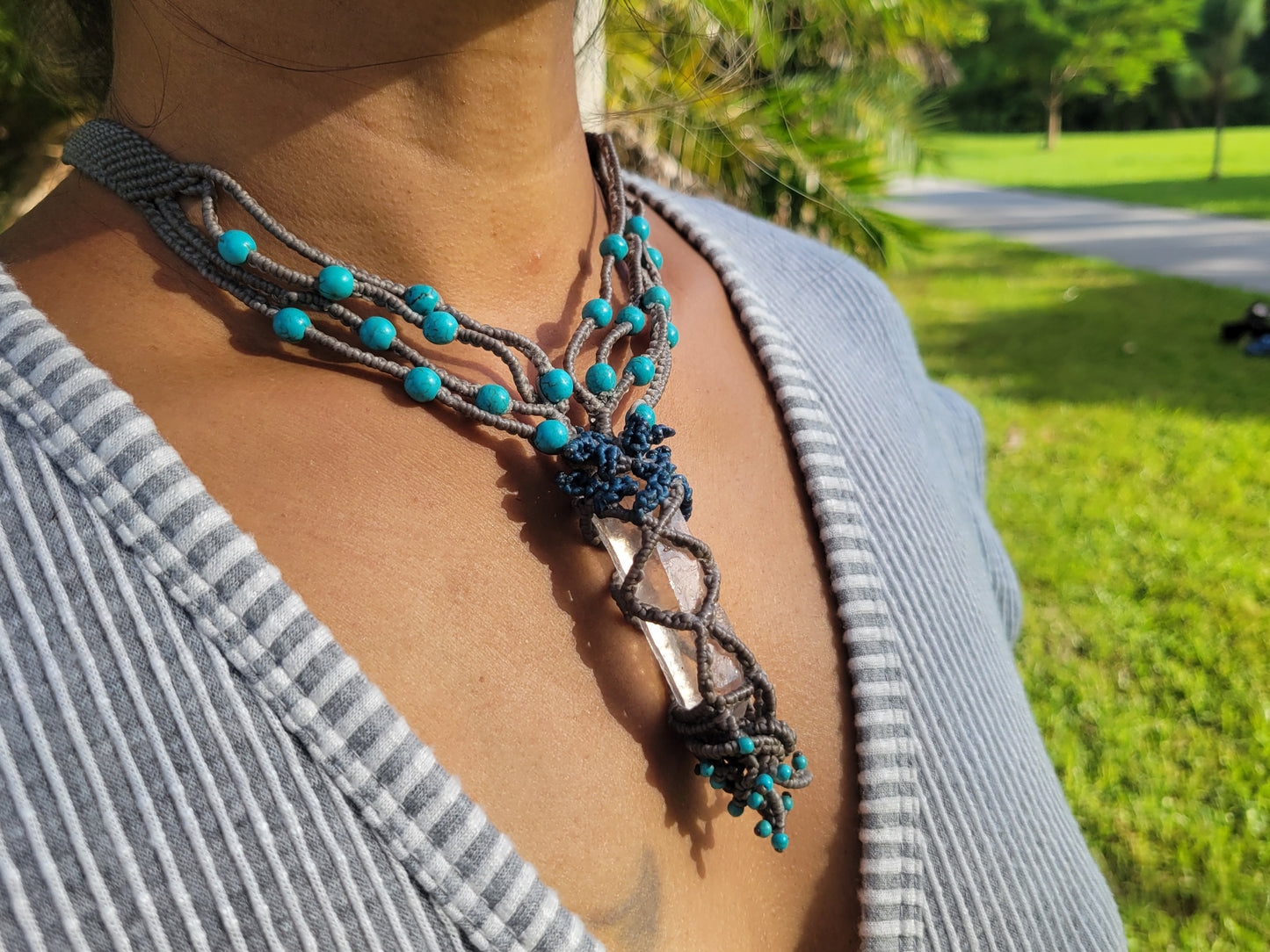 Nature inspired jewelry featuring clear crystal pendant