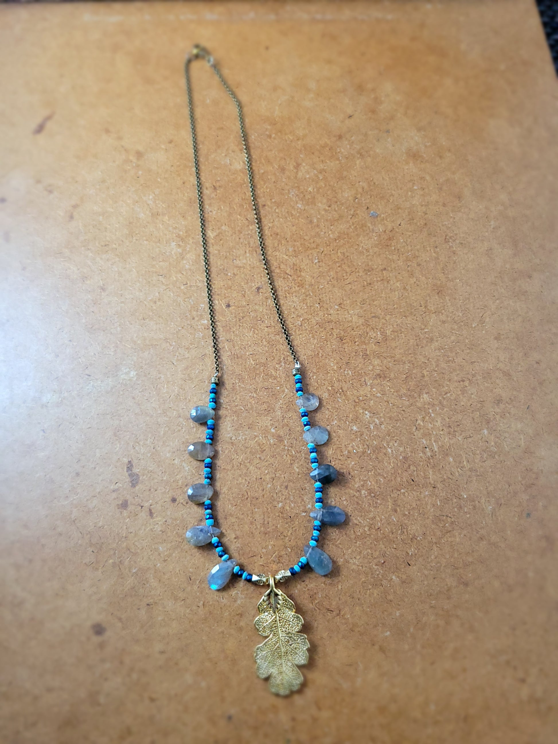 Boho Brass Leaf Pendant Necklace with brass chain and gemstones