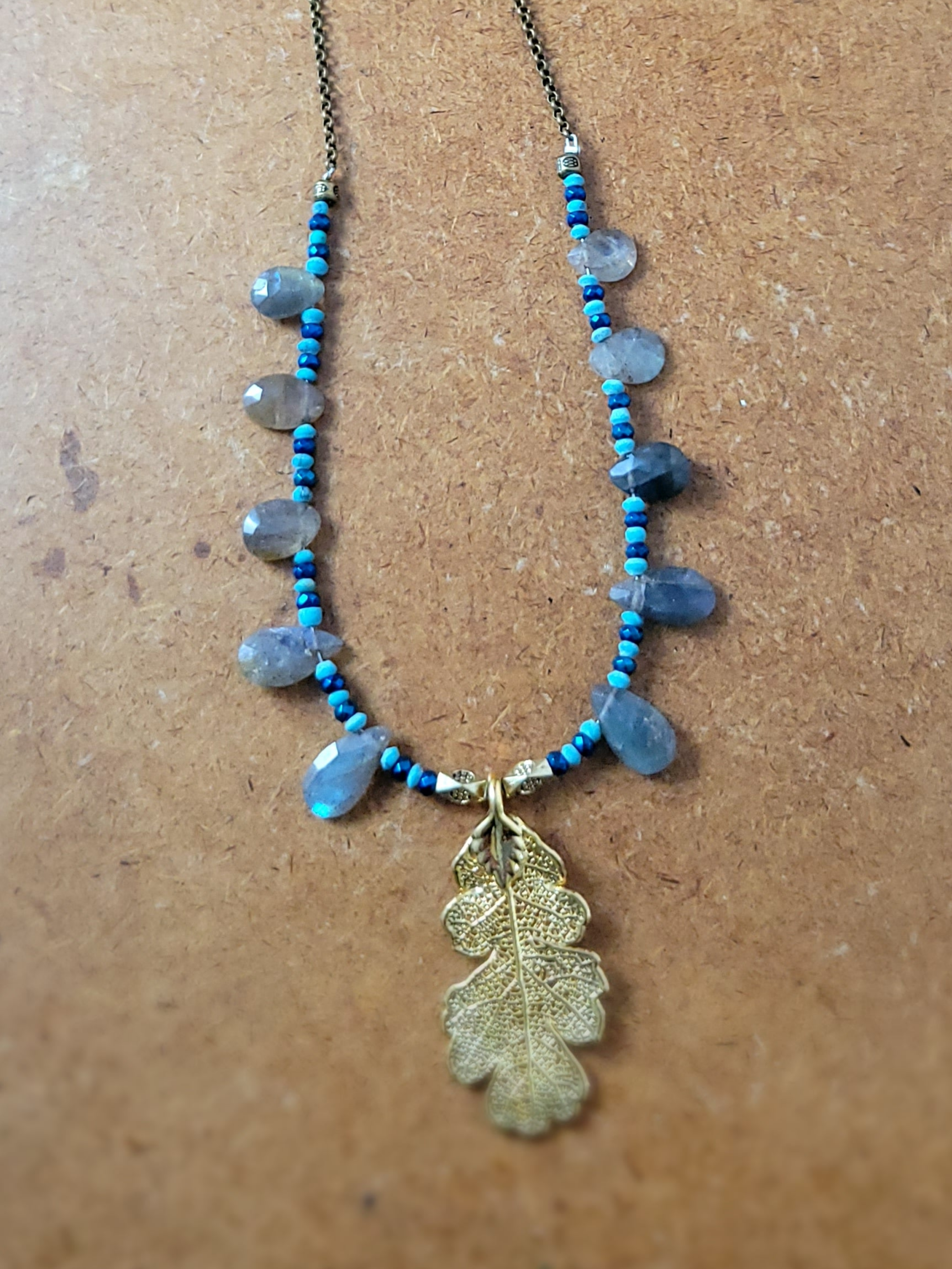 Brass Leaf Pendant Necklace with Labradorite and Aura Titanium accents