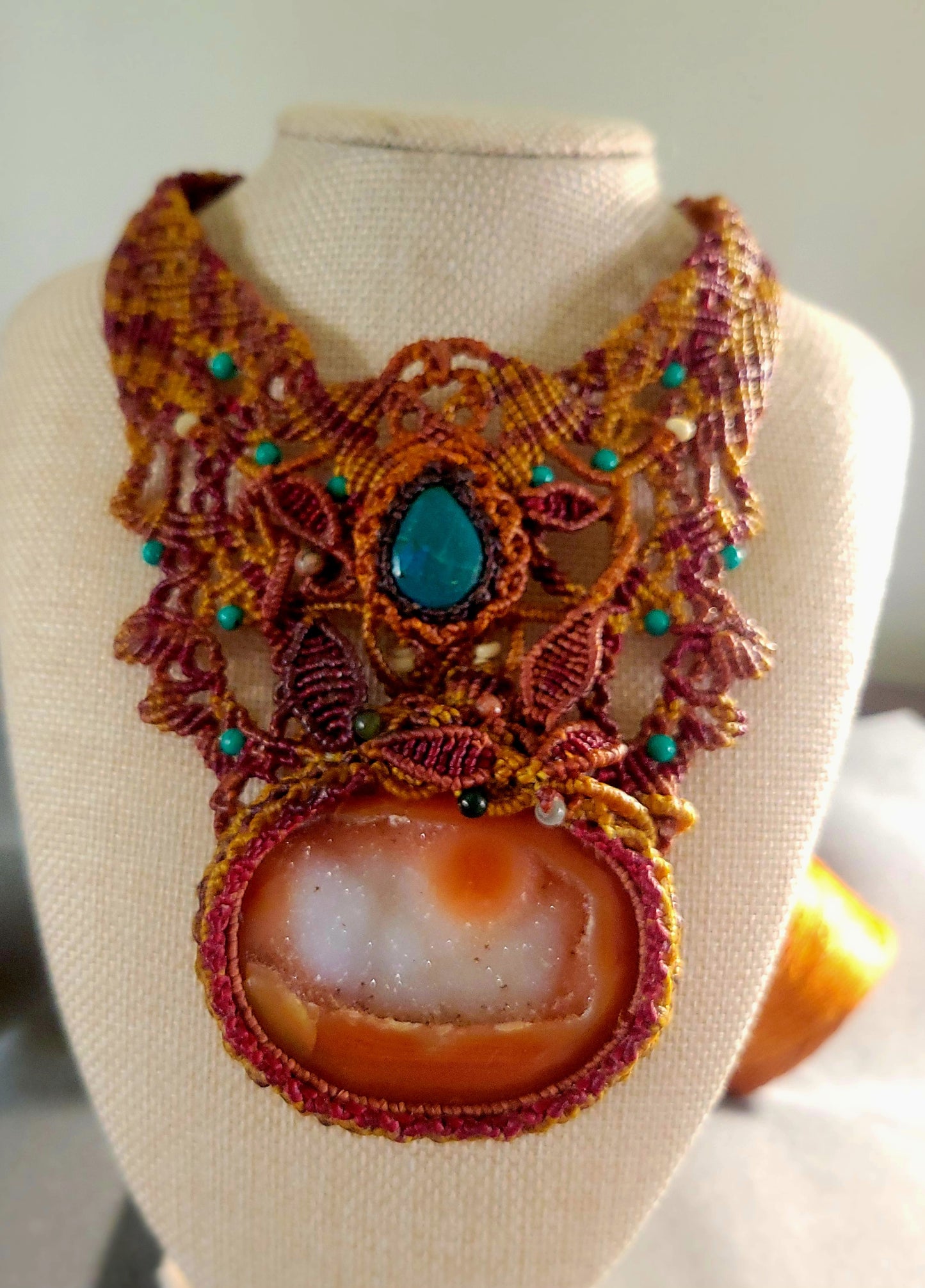 Carnelian Agate Pendant – Tribal Goddess statement choker with intricate macramé design and colorful stone accents.