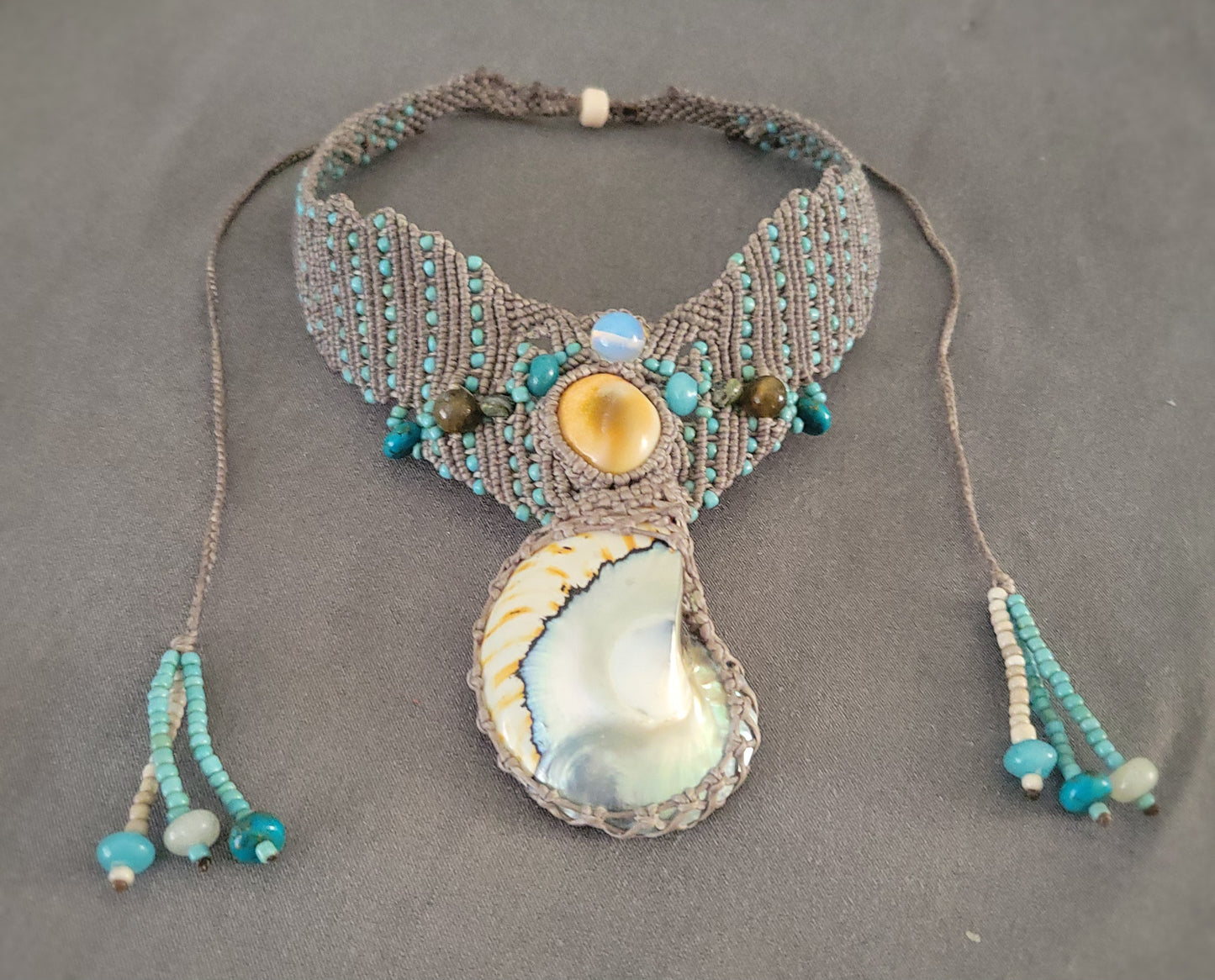 Boho Nautilus Shell Necklace with ocean-inspired macrame wrap