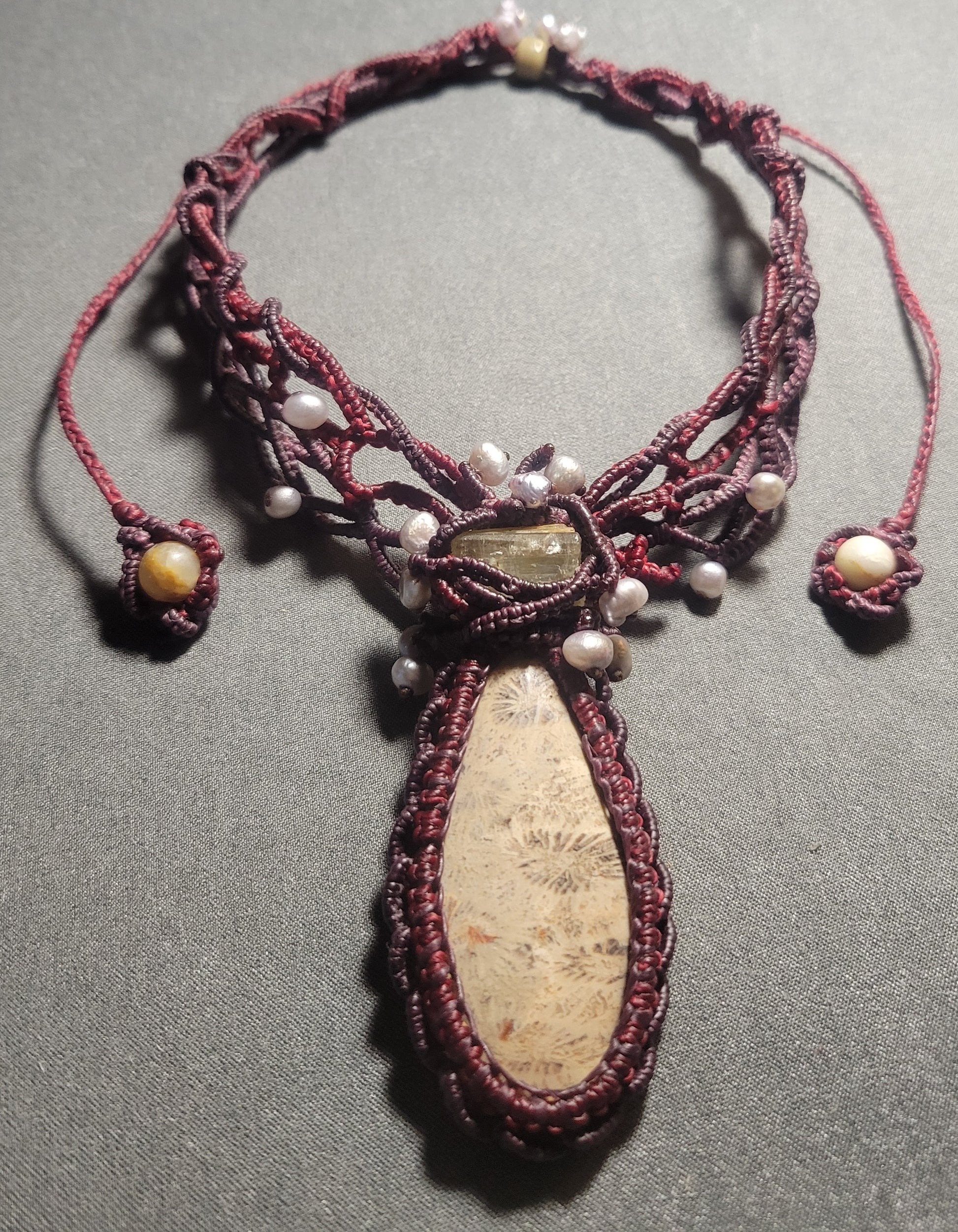 Close up of Nature inspired fossil coral pendant choker