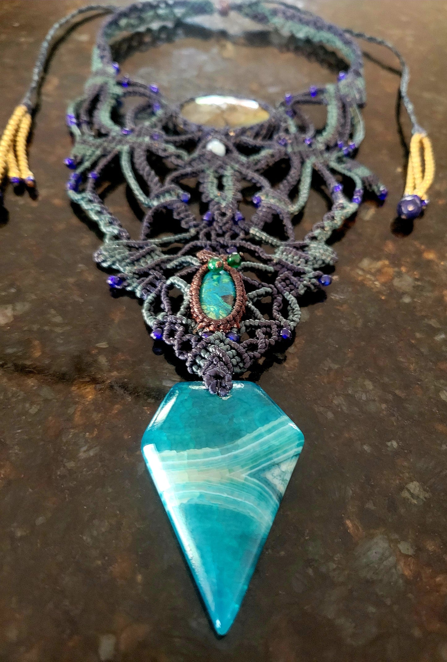Labradorite & Blue Agate Pendant featuring blue Agate arrow-shaped stone and ethereal micromacramé design.